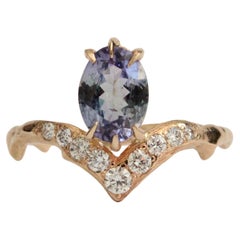 Oval Tanzanite 14k Yellow Gold Ring with Diamonds
