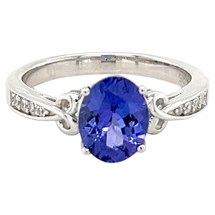 Oval Tanzanite and Cubic Zirconia Accent Ring in White Gold Cocktail Ring For Sale