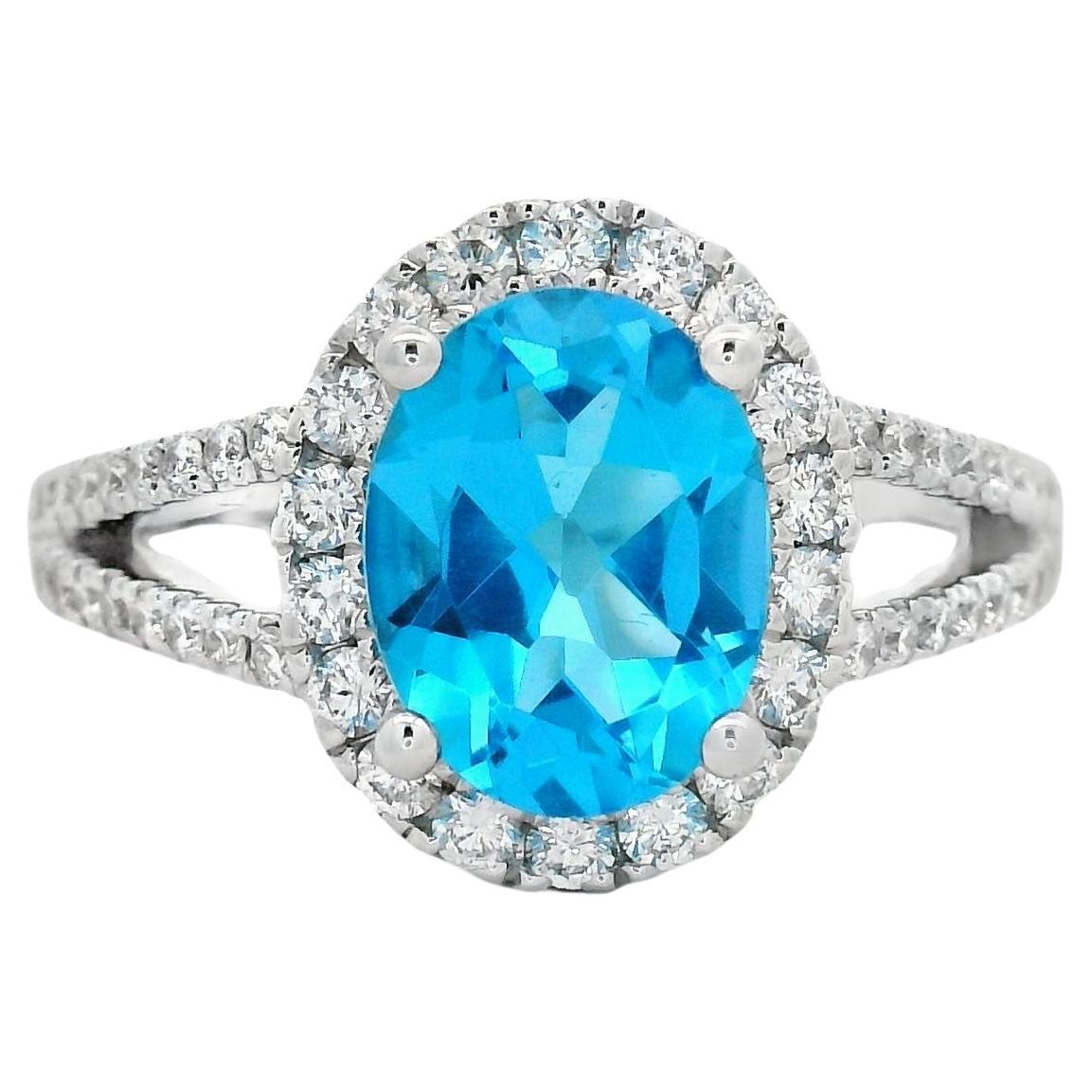 Oval Tanzanite and Diamond Halo Ring, 2.25ct in 14K White Gold Size 7 For Sale