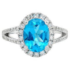 Oval Tanzanite and Diamond Halo Ring, 2.25ct in 14K White Gold Size 7