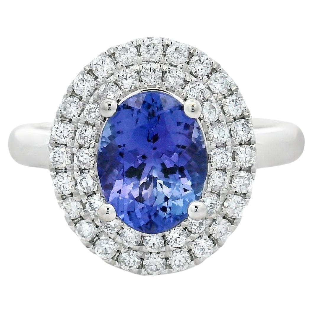 Oval Tanzanite and Diamond Halo Ring in 14K White Gold, Size 7 For Sale