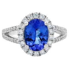 Oval Tanzanite and Diamond Halo Ring in 14K White Gold, Size 7