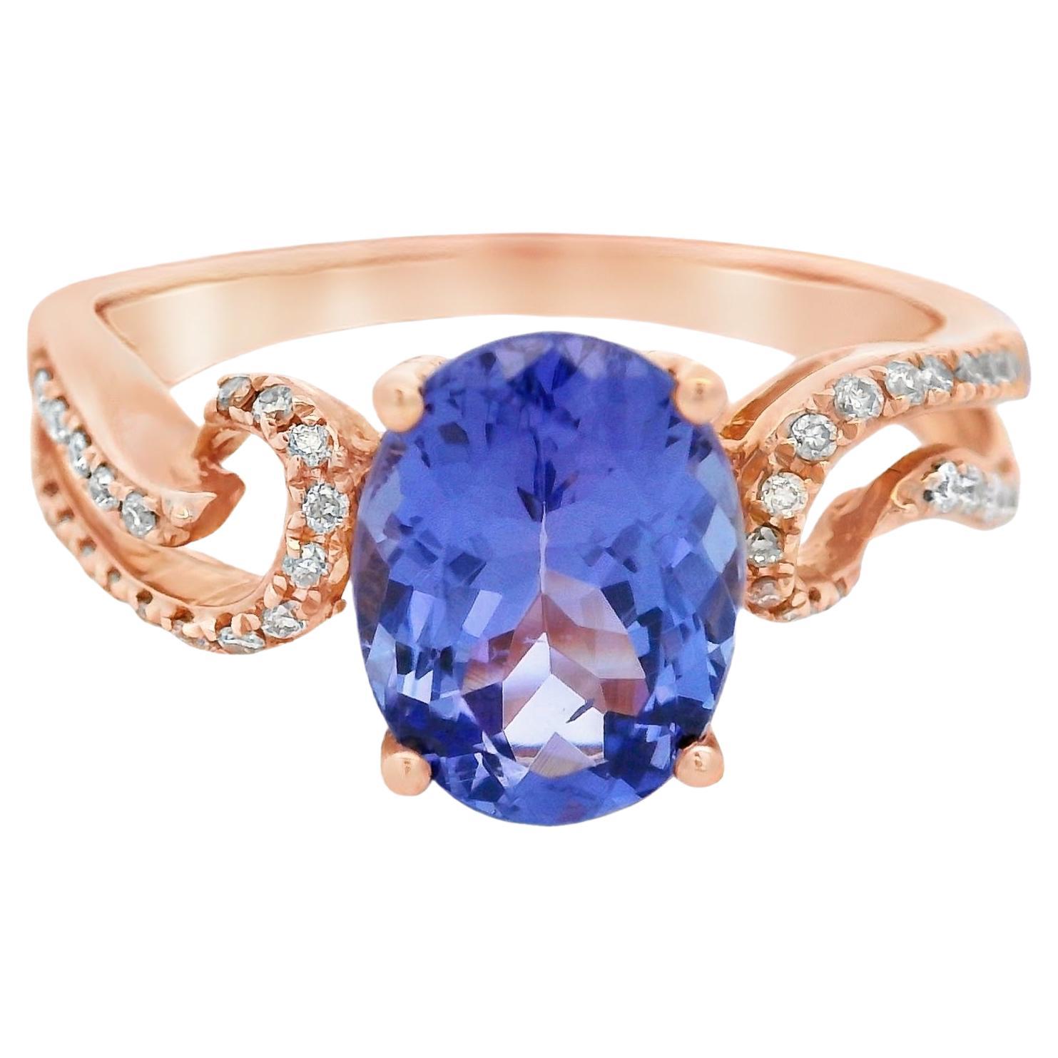 Anello ovale con tanzanite e diamanti in oro rosa 14K con centro da 2,05 carati, misura 7 in vendita
