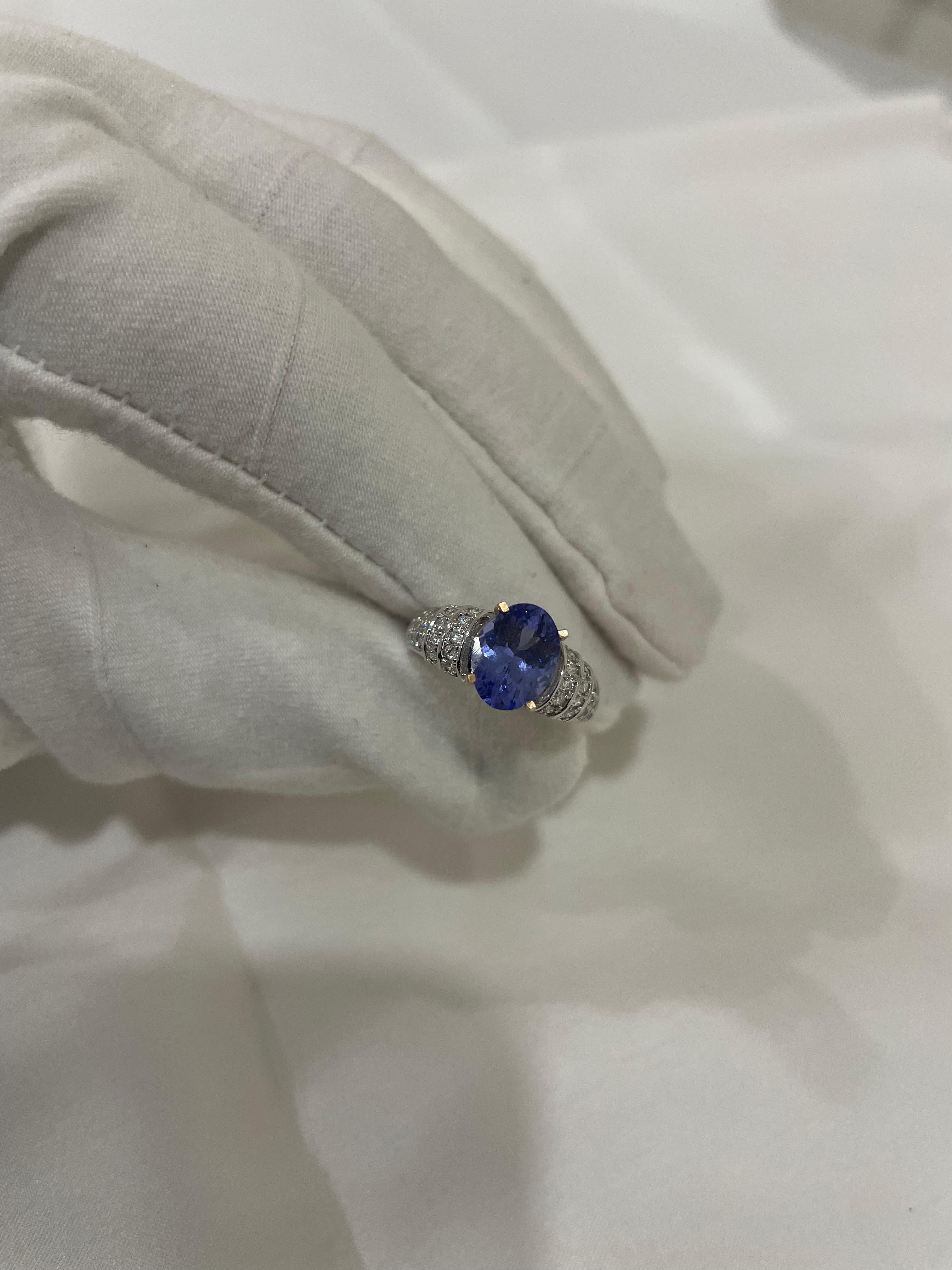 For Sale:  Oval Tanzanite and Diamond Ring in 18k Solid White Gold 9