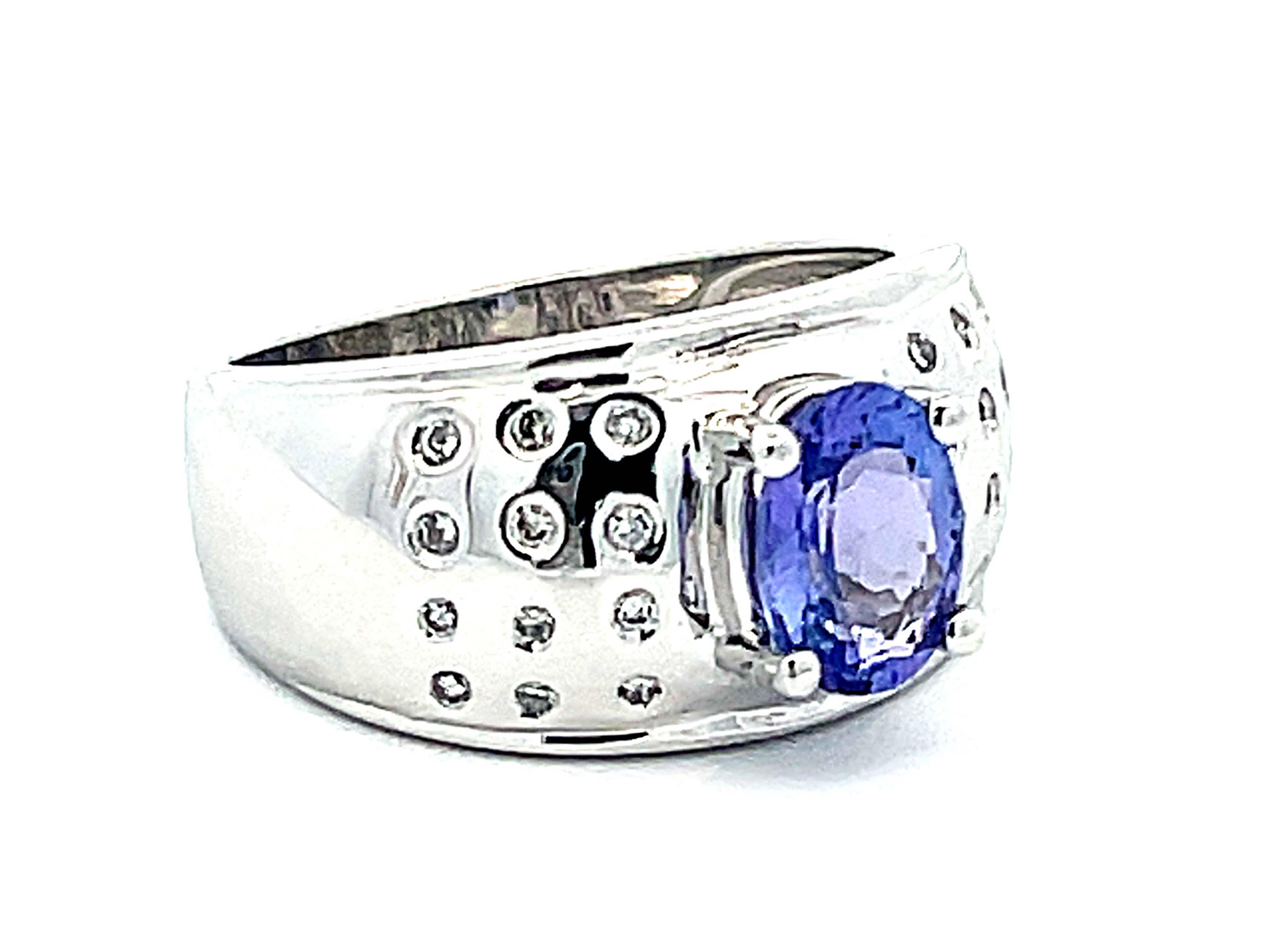 Modern Oval Tanzanite and Diamond Studded Wide Dome Ring in Platinum For Sale