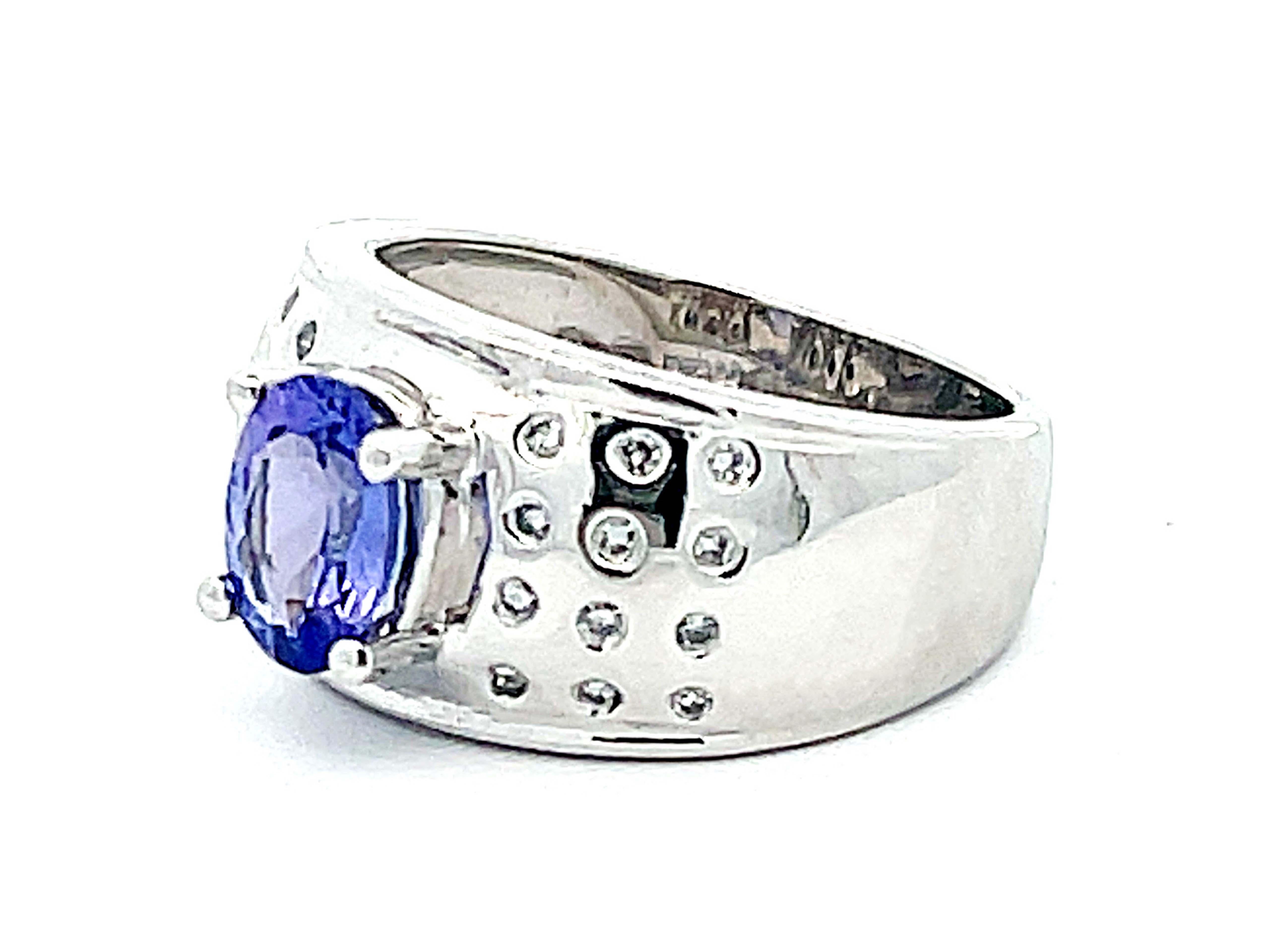 Oval Cut Oval Tanzanite and Diamond Studded Wide Dome Ring in Platinum For Sale