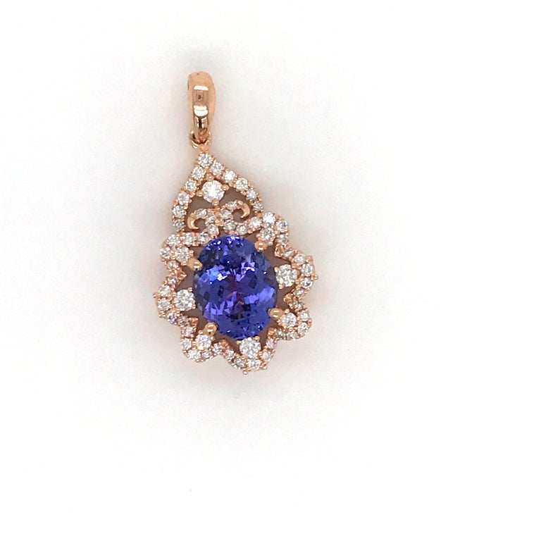 18ct White Gold 0.41ct Oval Tanzanite & Diamond Pendant