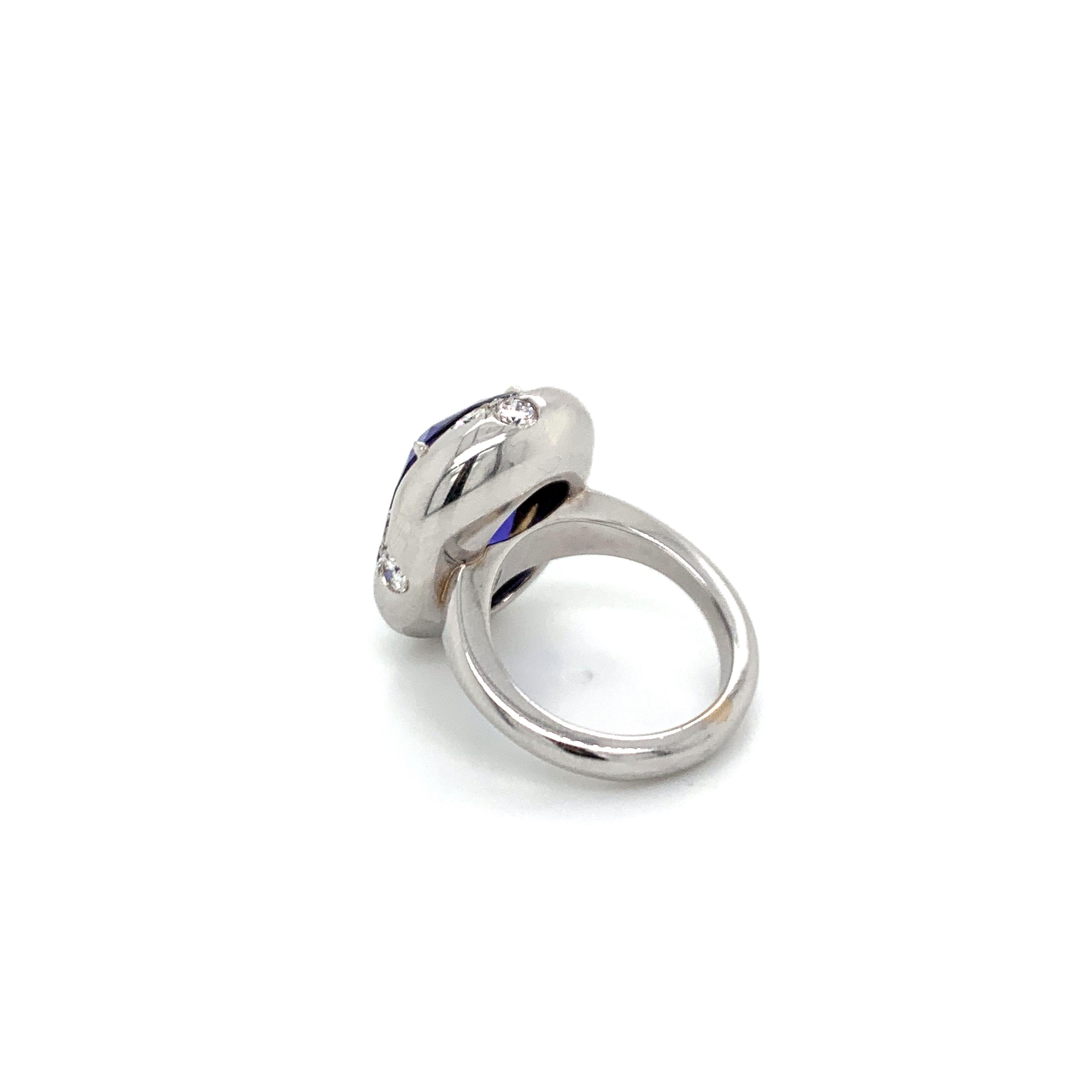 Women's or Men's Oval Tanzanite Diamond Platinum Ring For Sale