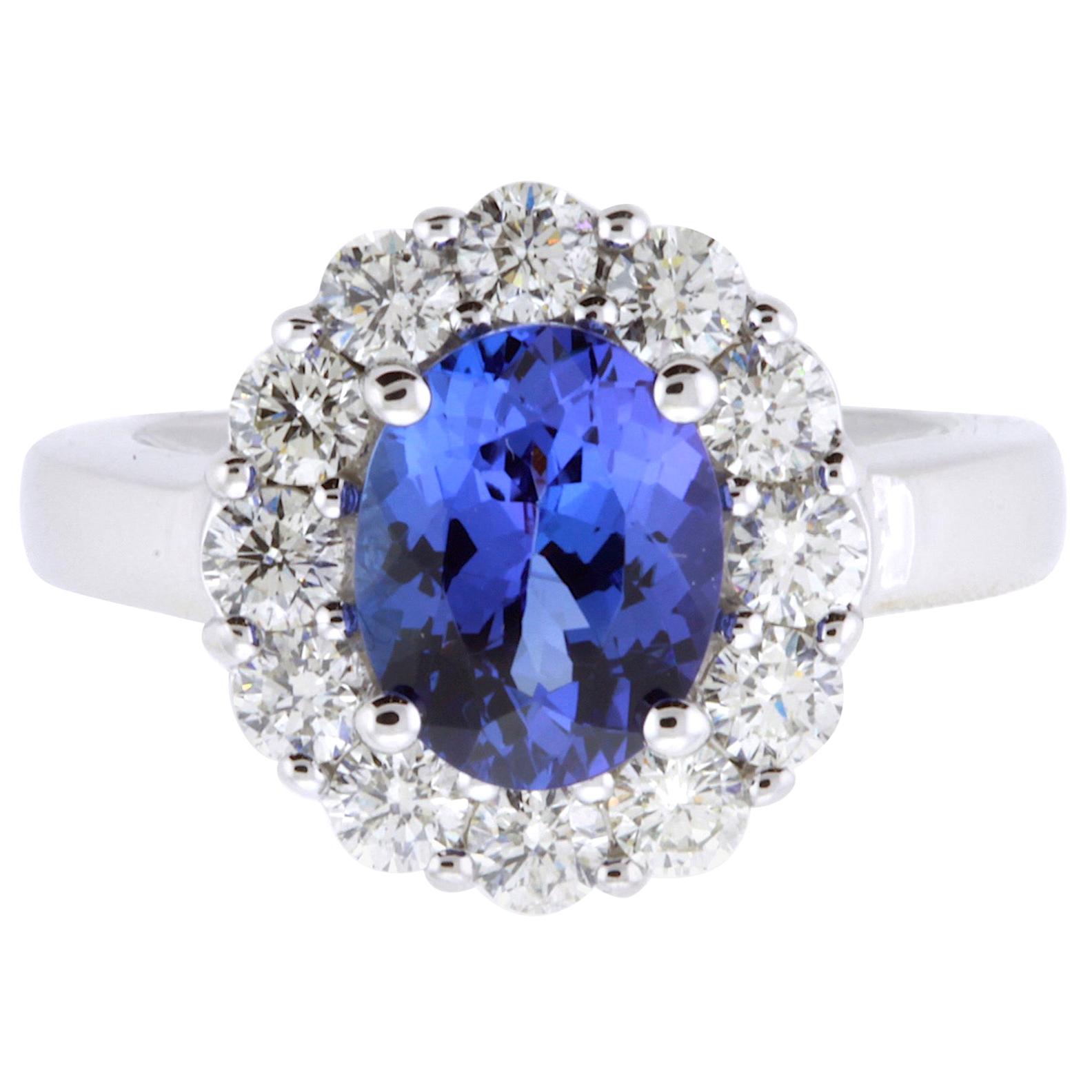 Emerald Cut Tanzanite and Baguette Diamond Engagement Ring at 1stDibs