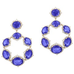 Goshwara Boucles d'oreilles créoles ovales en tanzanite