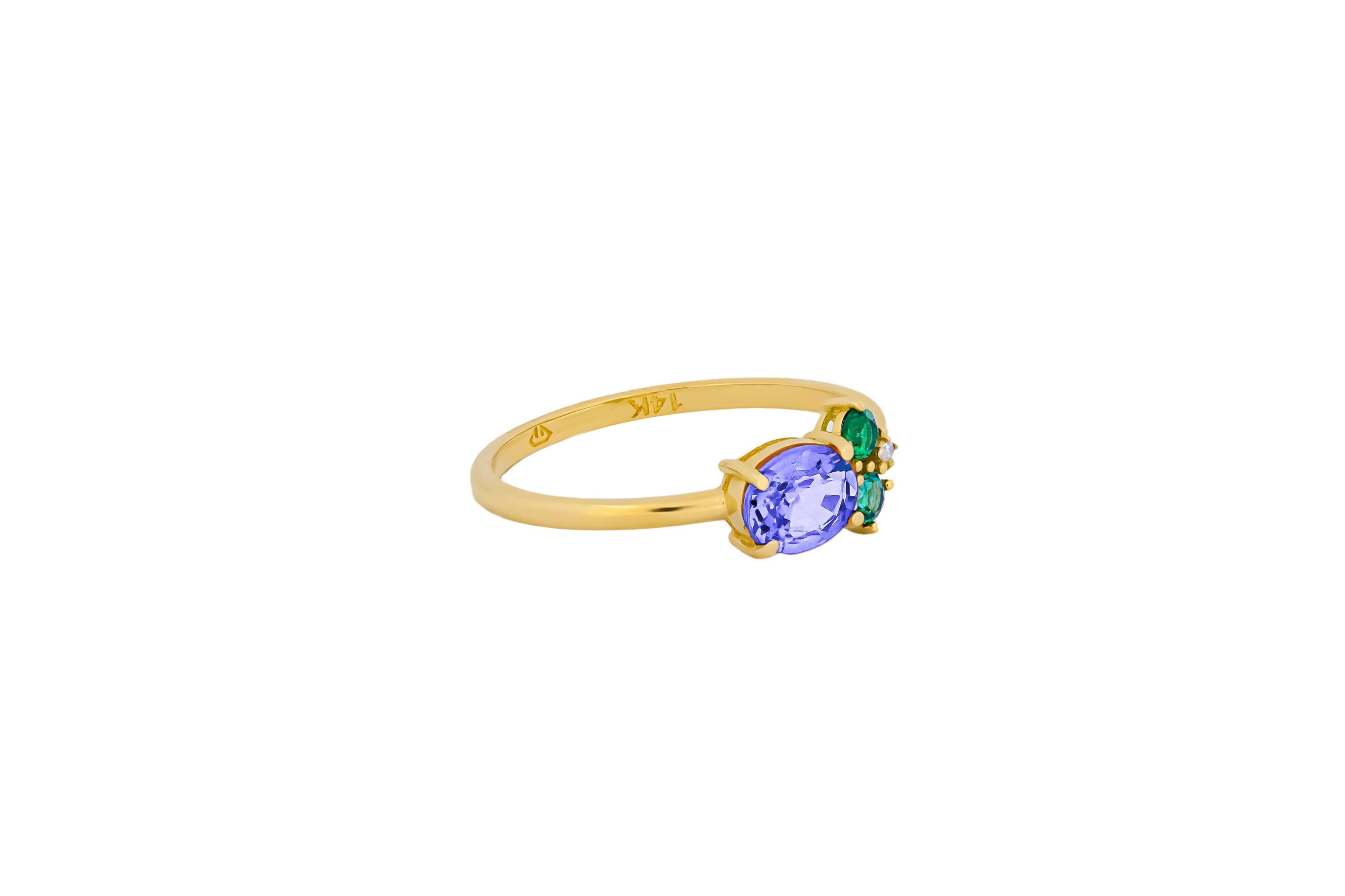 Oval tanzanite, tsavorite and diamonds 14k gold ring. In New Condition For Sale In Istanbul, TR