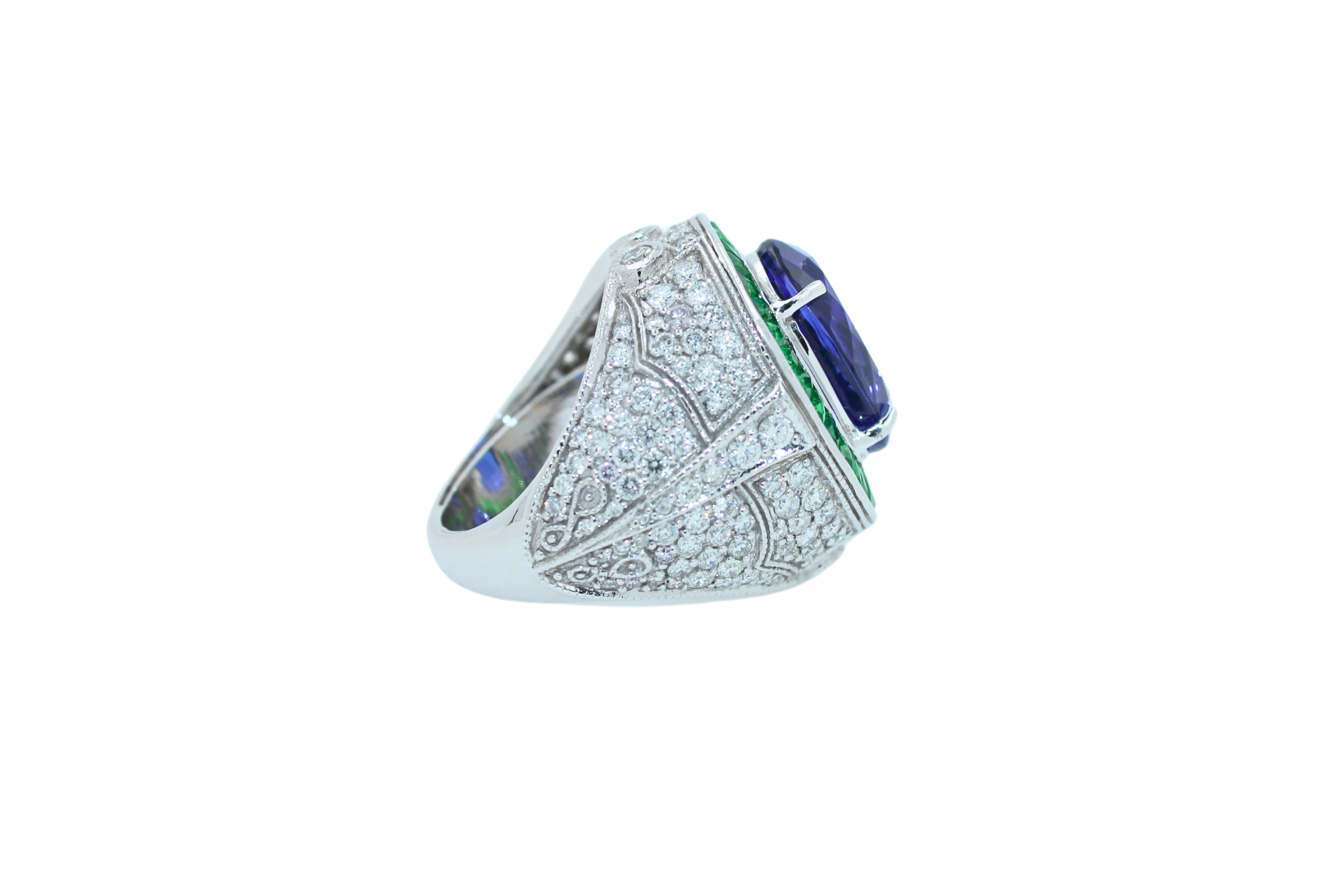Brilliant Cut Oval Tanzanite Tsavorite Halo Diamond Pave Dome Signet 18 Karat White Gold Ring For Sale