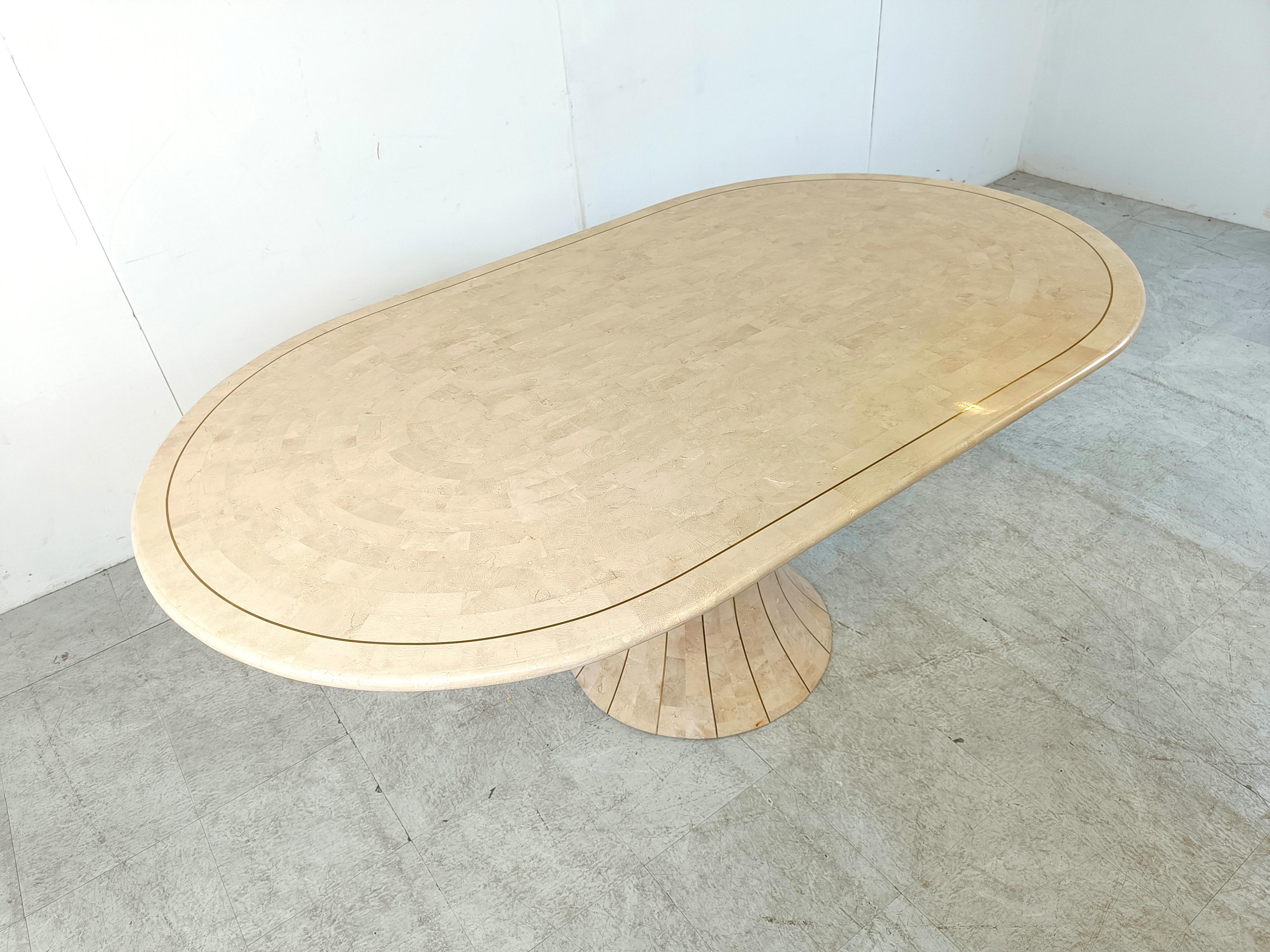 Oval tesselated stone dining table by Maithland smith, 1970s  3