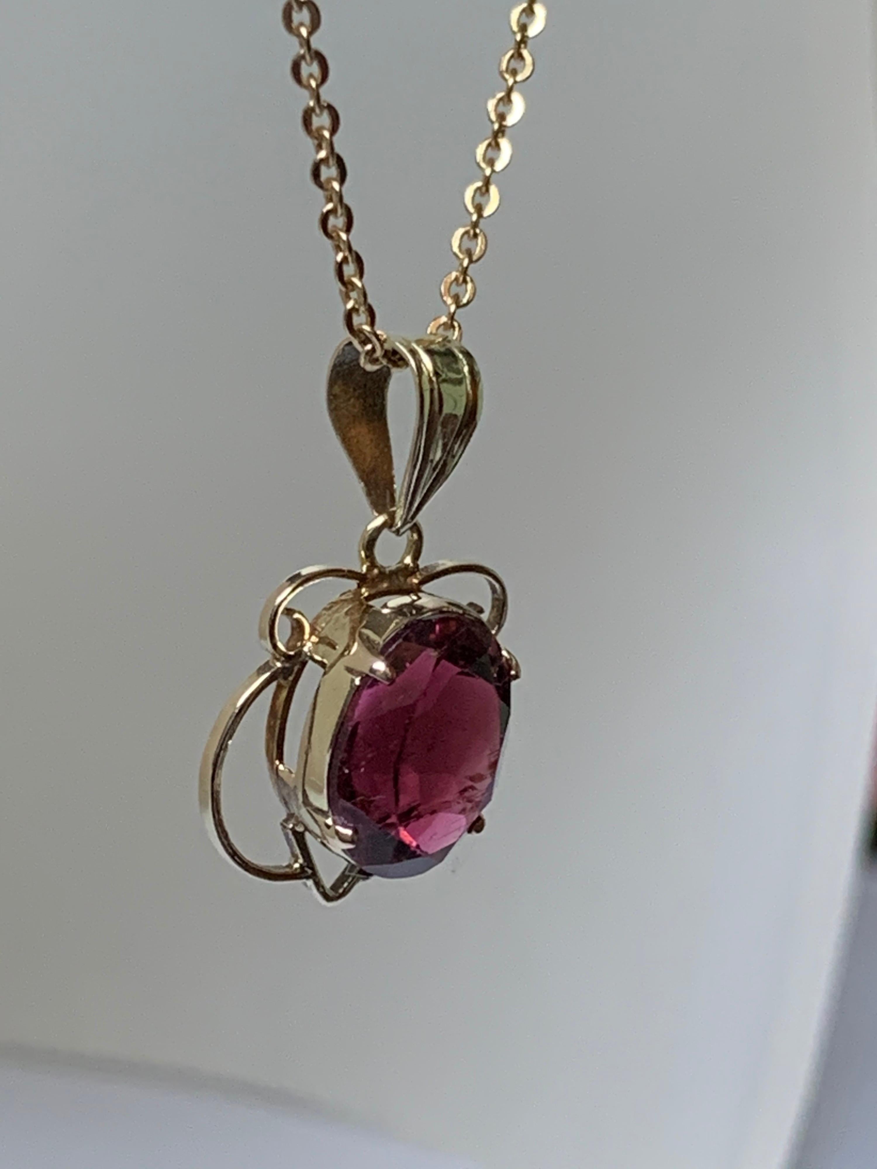 Natural Brownish Pink Tourmaline is 100% Natural stone from mother earth. The stone is hand cut and polished. the stone is set in 14 Karat Yellow Gold ,The size of the stone is 8 mm X 10 mm.

Note: Chain is not included in this pendant.