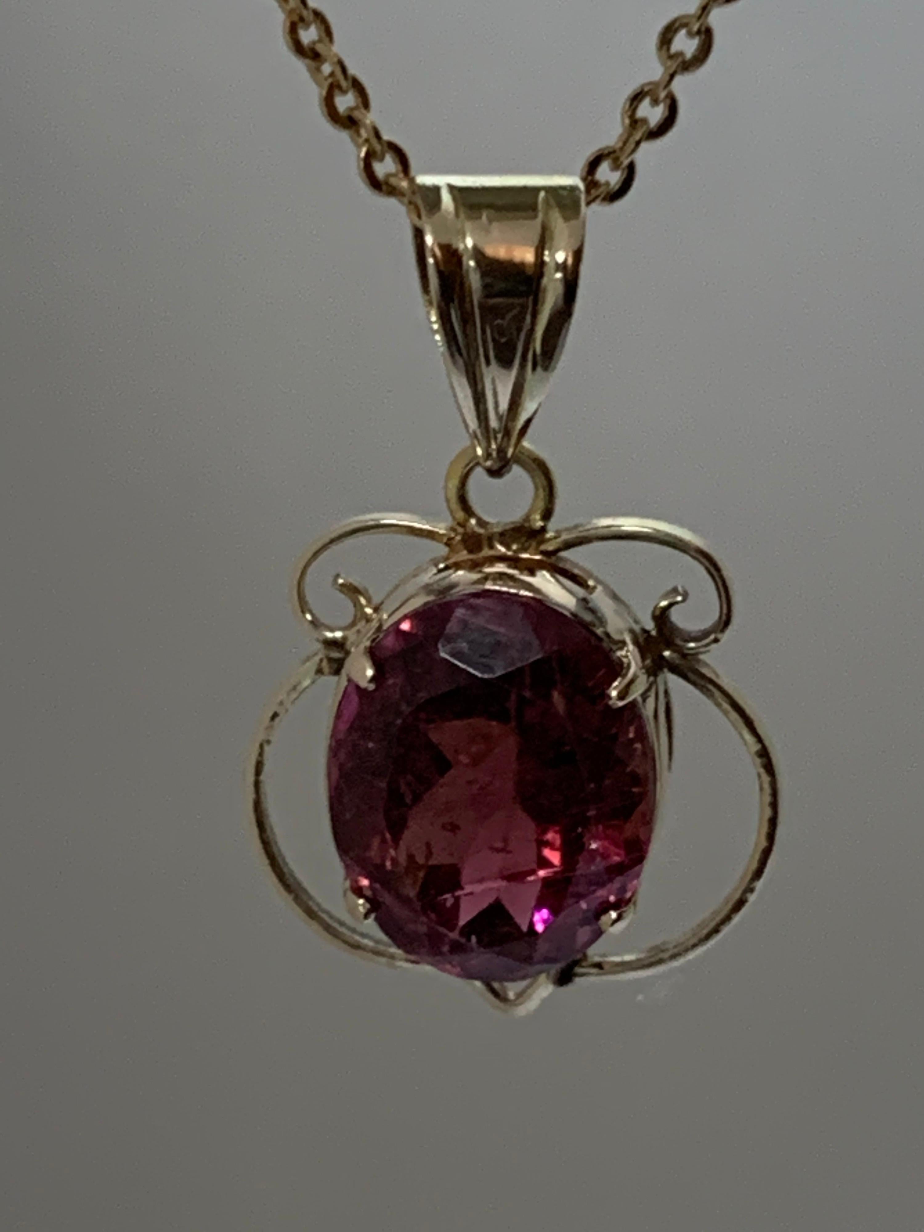 Oval Cut Oval Tourmaline Set in 14 Karat Gold Pendant For Sale