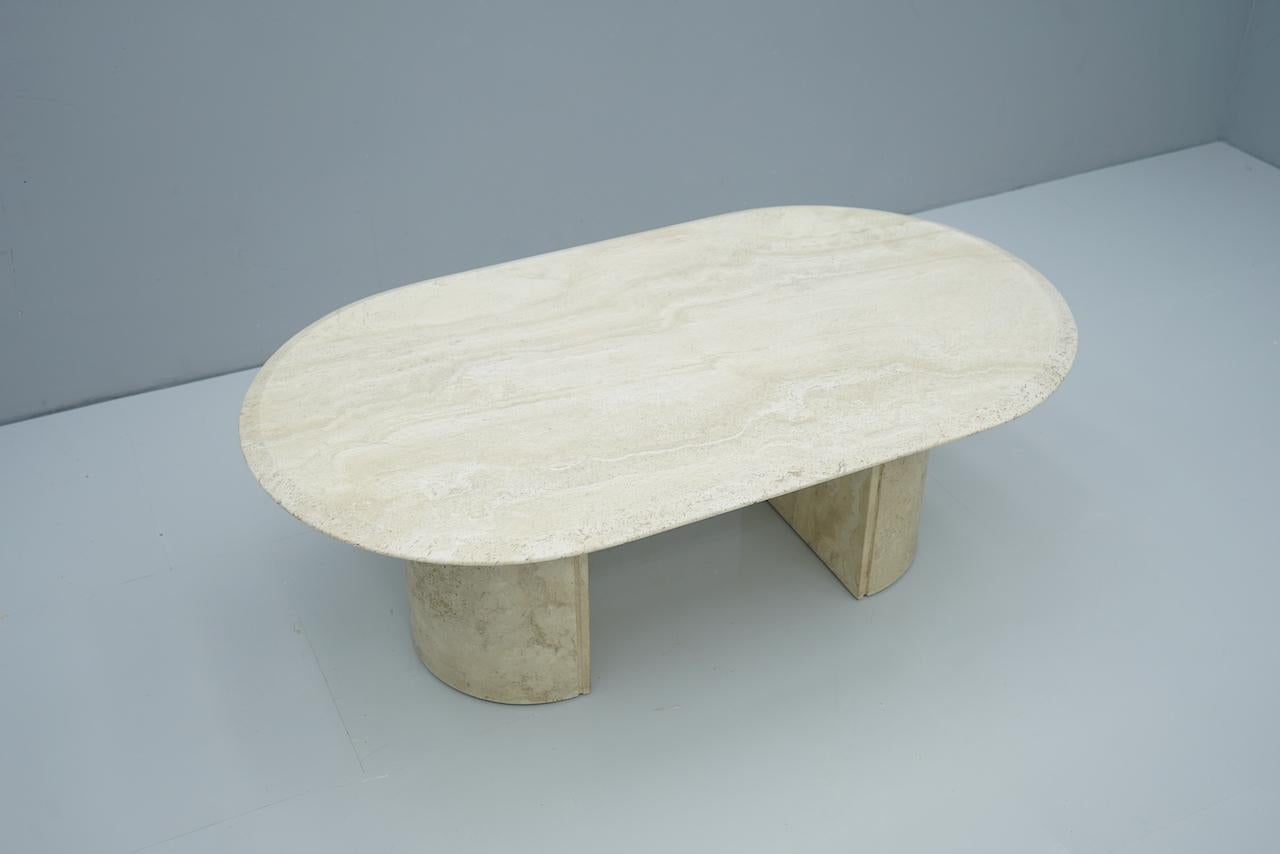 Oval travertine coffee table, Italy, 1970s.

Very good condition.