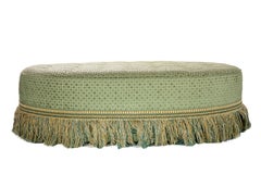 Oval Upholstered Tufted Ottoman