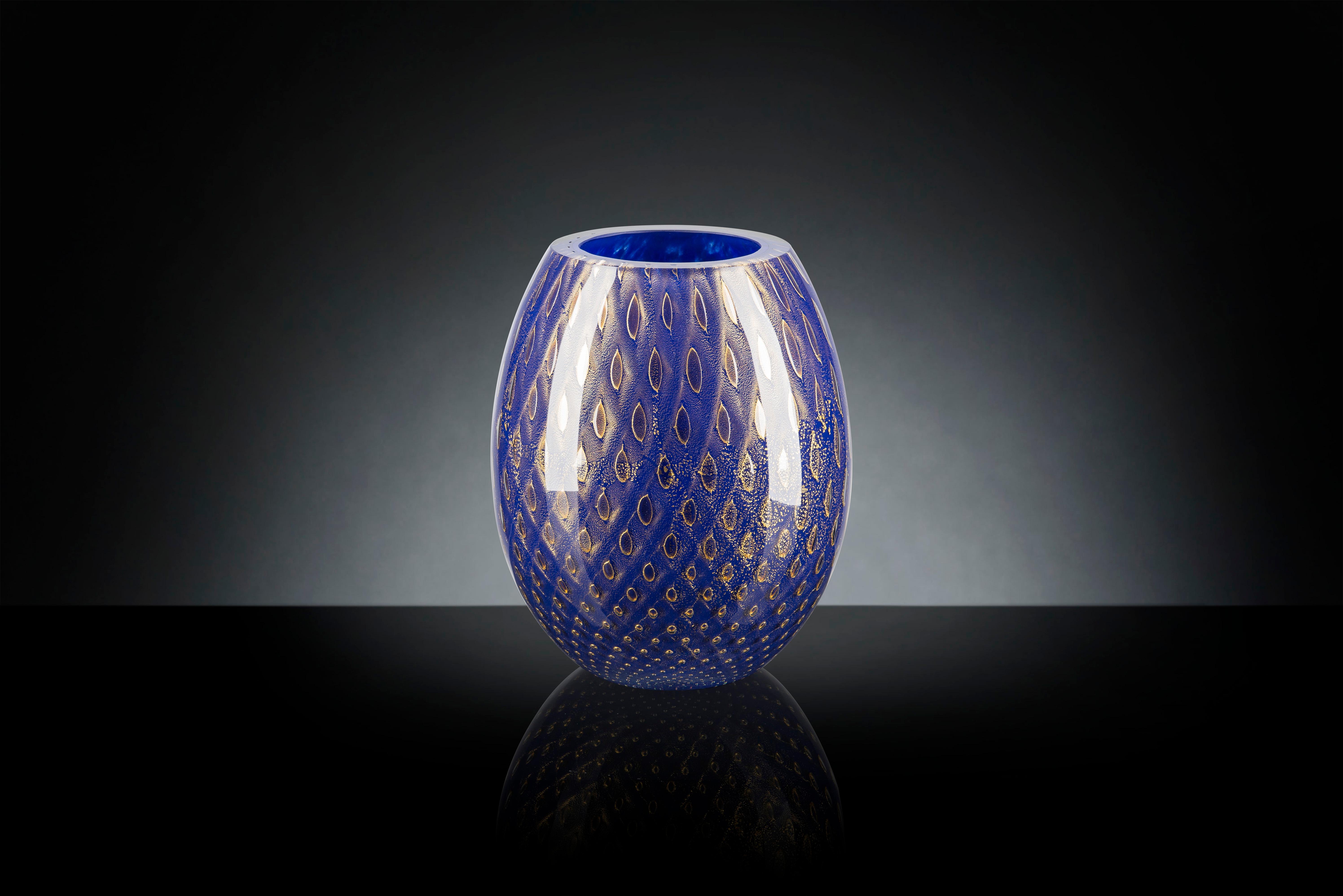 navy blue and gold vase