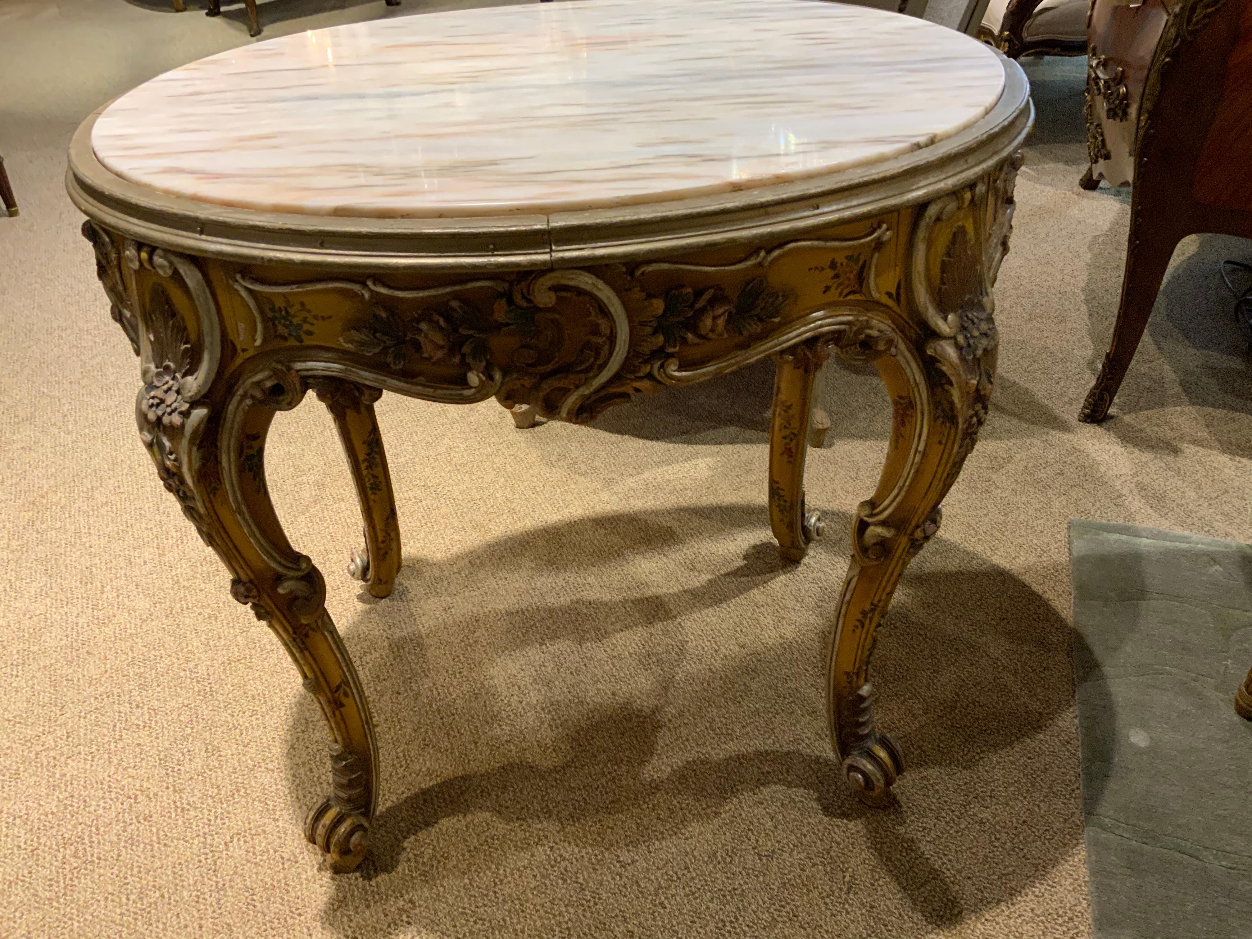 Louis XV Oval Venetian Carved and Polychrome Table with a Cream, Gold and Pale Gray Veins For Sale