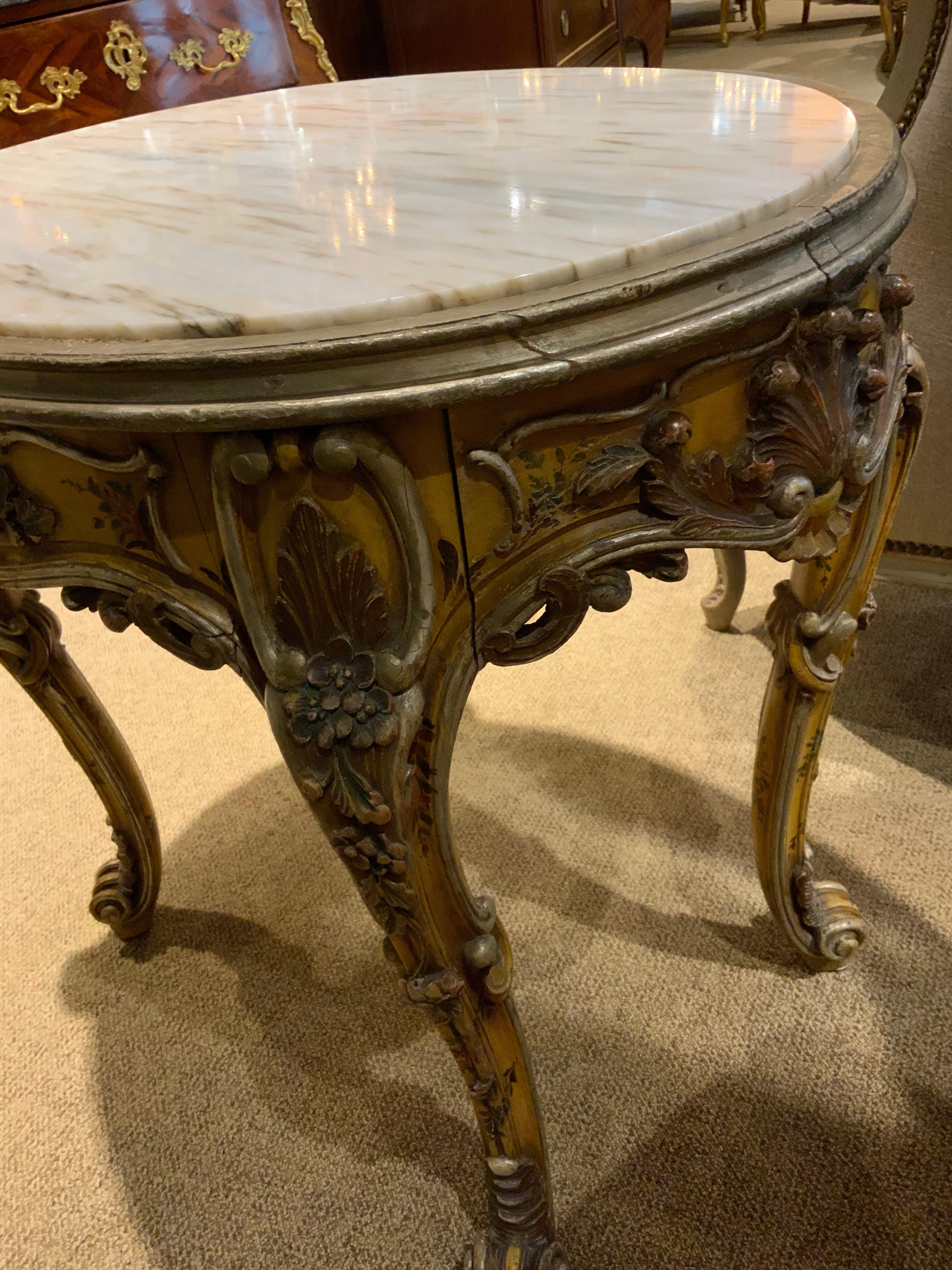 Polychromed Oval Venetian Carved and Polychrome Table with a Cream, Gold and Pale Gray Veins For Sale