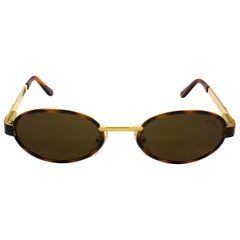 Oval vintage sunglasses by Sting, Italy