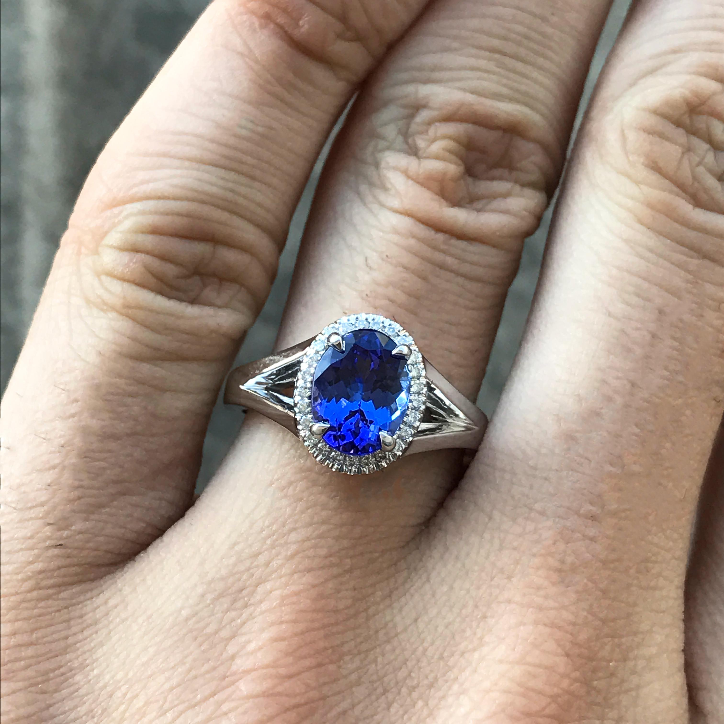 Ring will be made to order for your finger size, please allow 3-6 weeks.

Stunning 2.00 Carat  Oval Tanzanite set in a hand designed 18k White Gold.
The stone is enhanced three round diamonds on each side.

AS015 - 2000071

Center Stone Details: