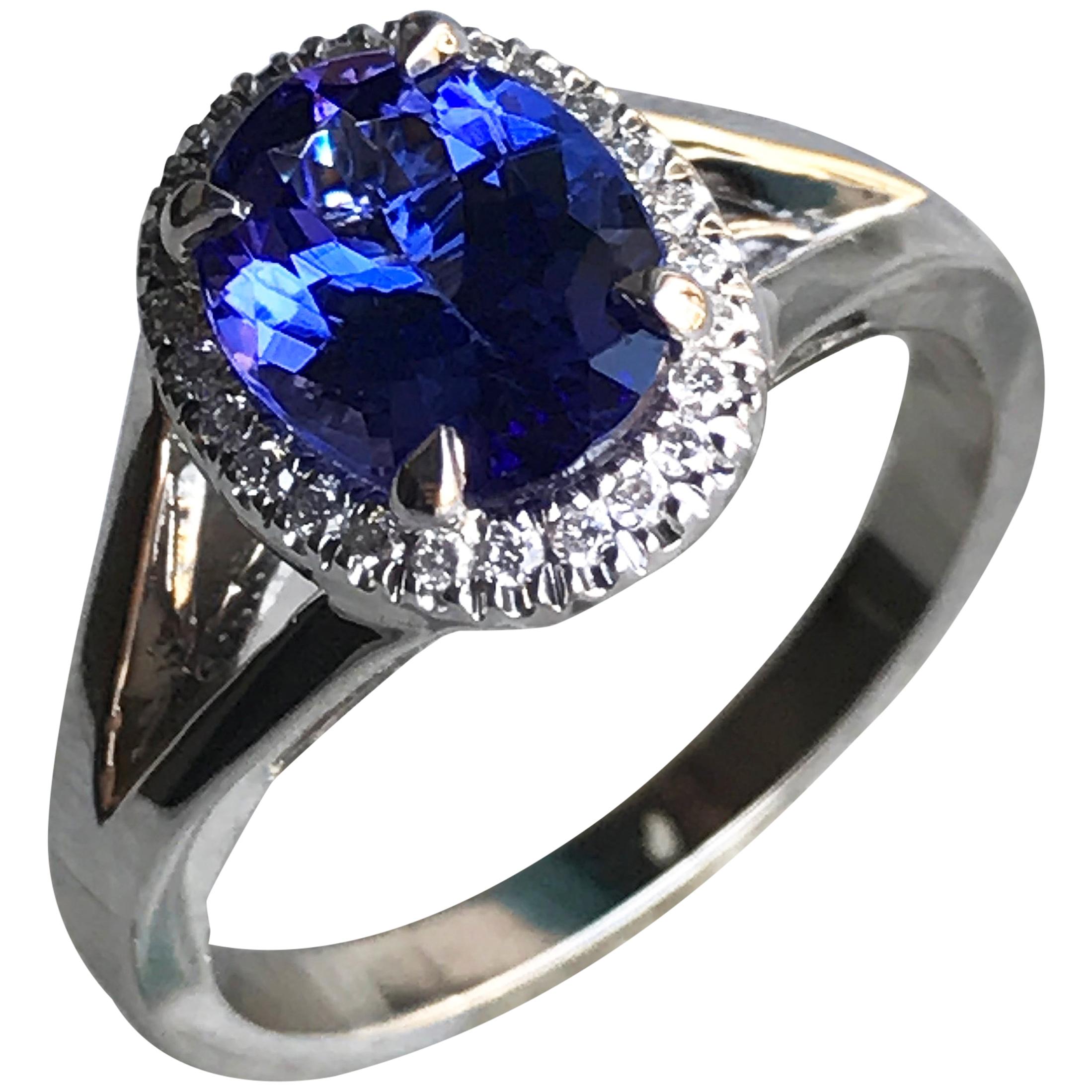 Oval Violet Tanzanite with Diamond Engagement Halo Ring, 18 Karat White Gold For Sale
