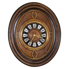 Orologio da parete ovale con intarsi, inizio XX secolo