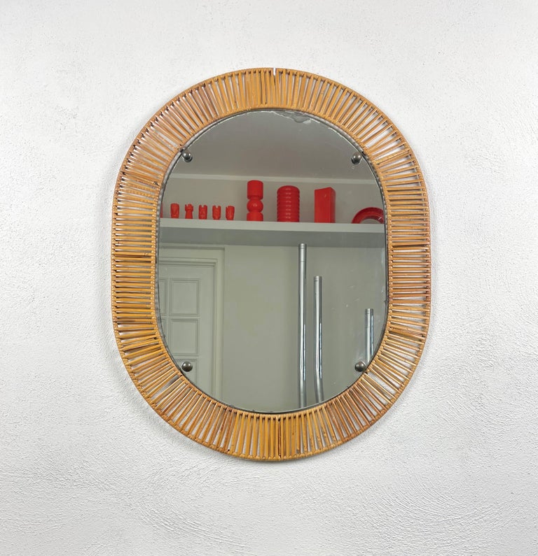 Oval Wall Mirror in Rattan & Iron, Italy, 1960s In Good Condition For Sale In Rome, IT