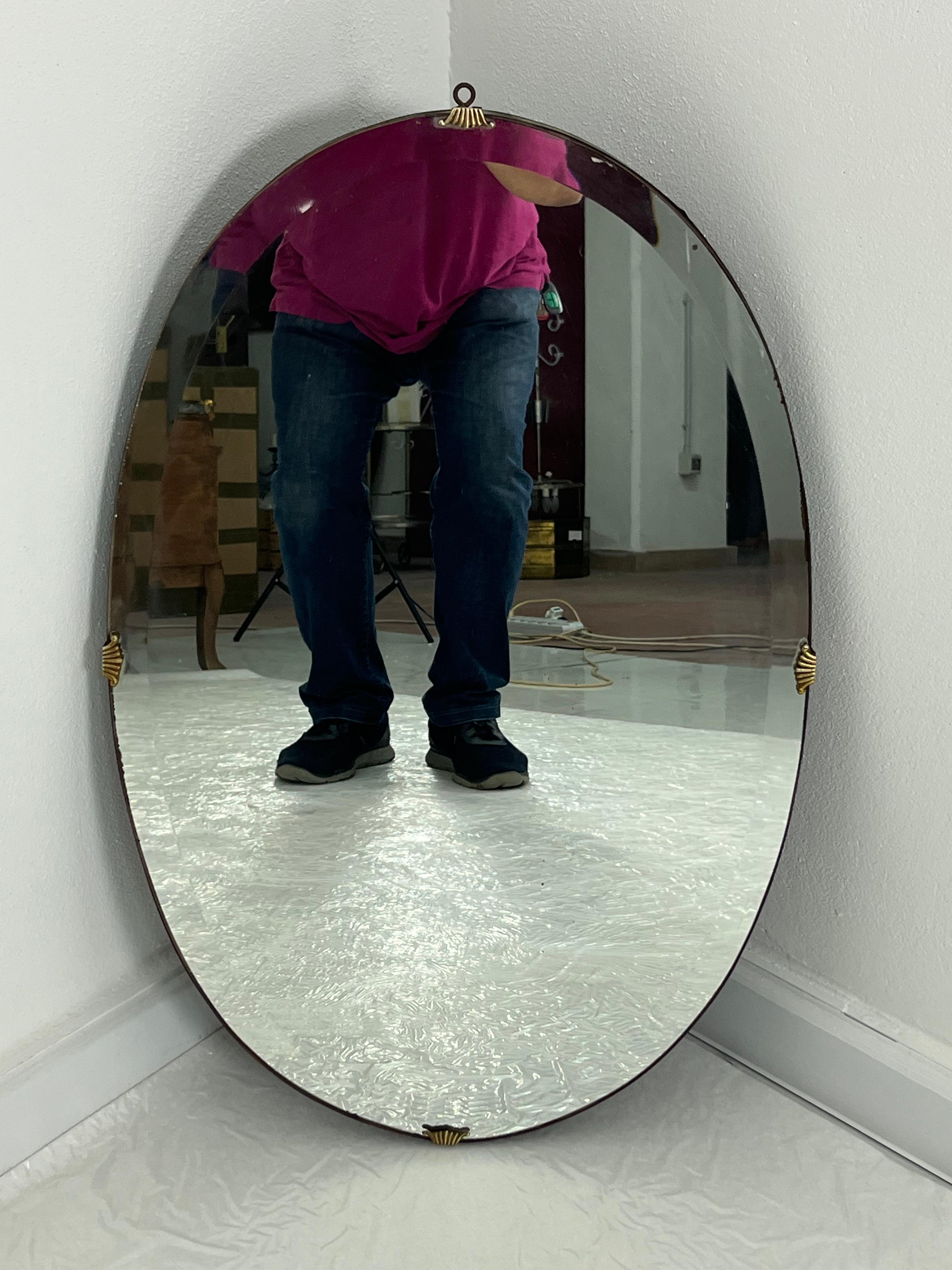 Mid-20th Century Oval Wall Mirror With Brass Shell Inserts attributed to Gio Ponti, 1960s For Sale