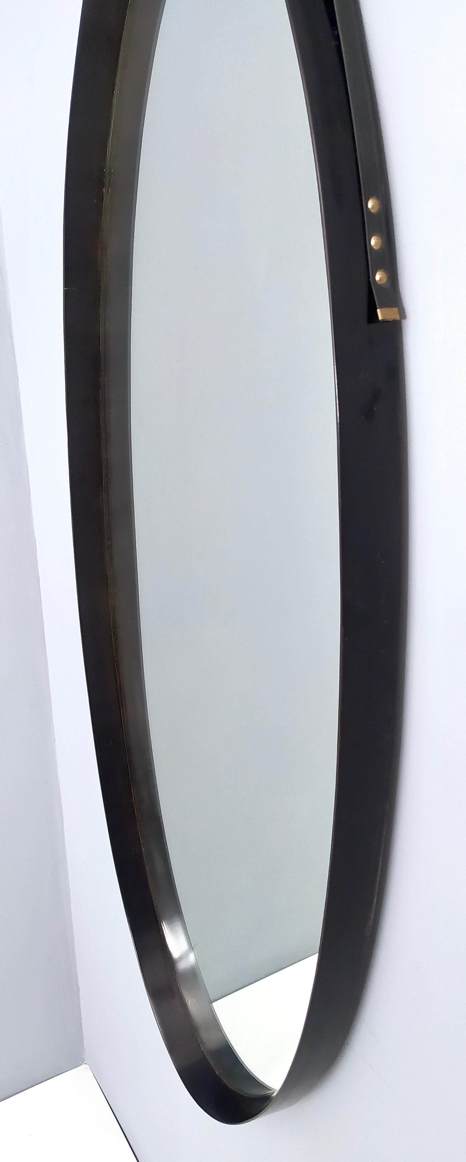 Oval Vintage Wall Mirror with Ebonized Wood Frame and a Leather Hook, Italy 1