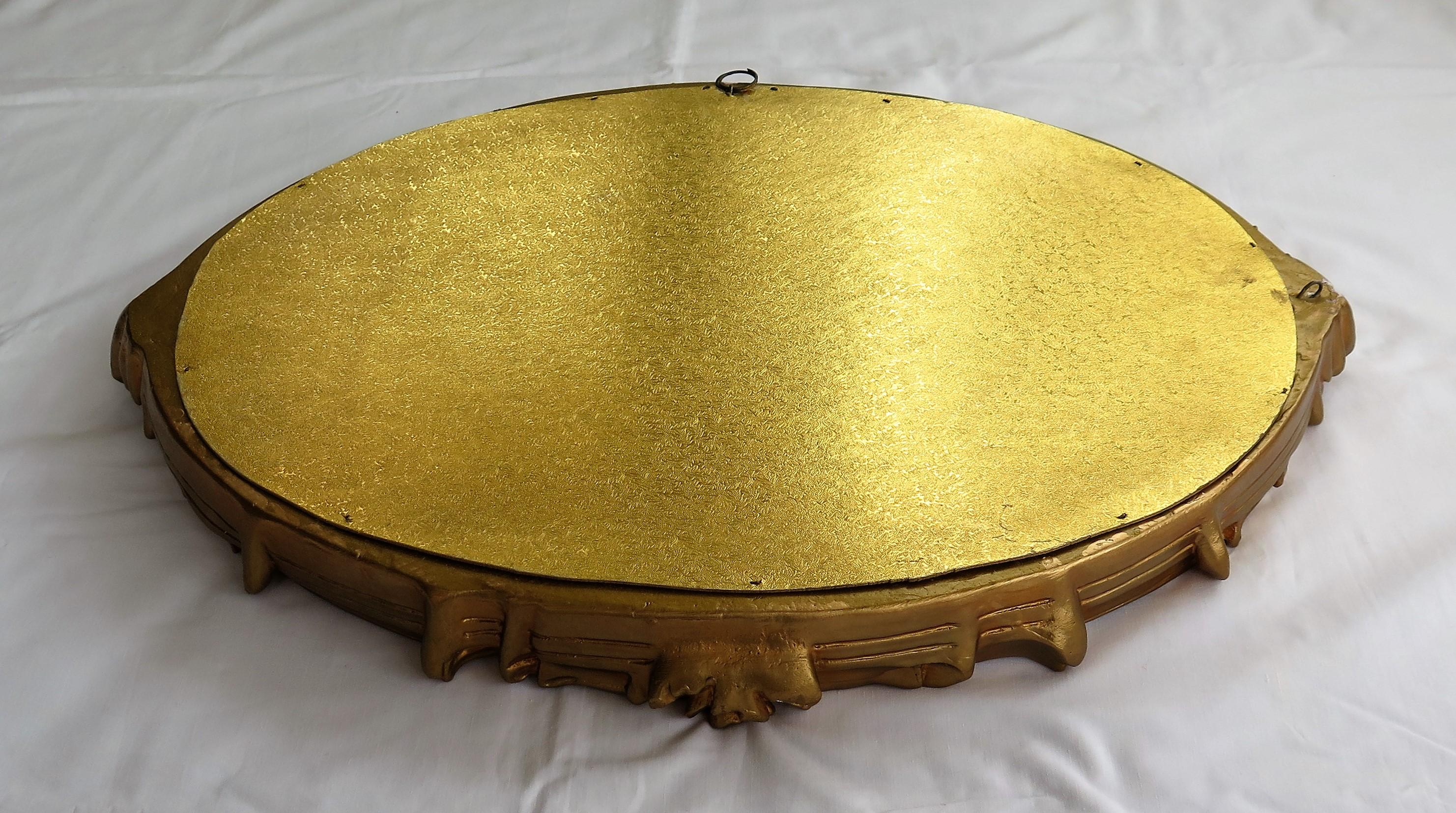 Oval Wall Mirror with Rococo Gold Finish Frame of Gesso on Wood, circa 1930 12