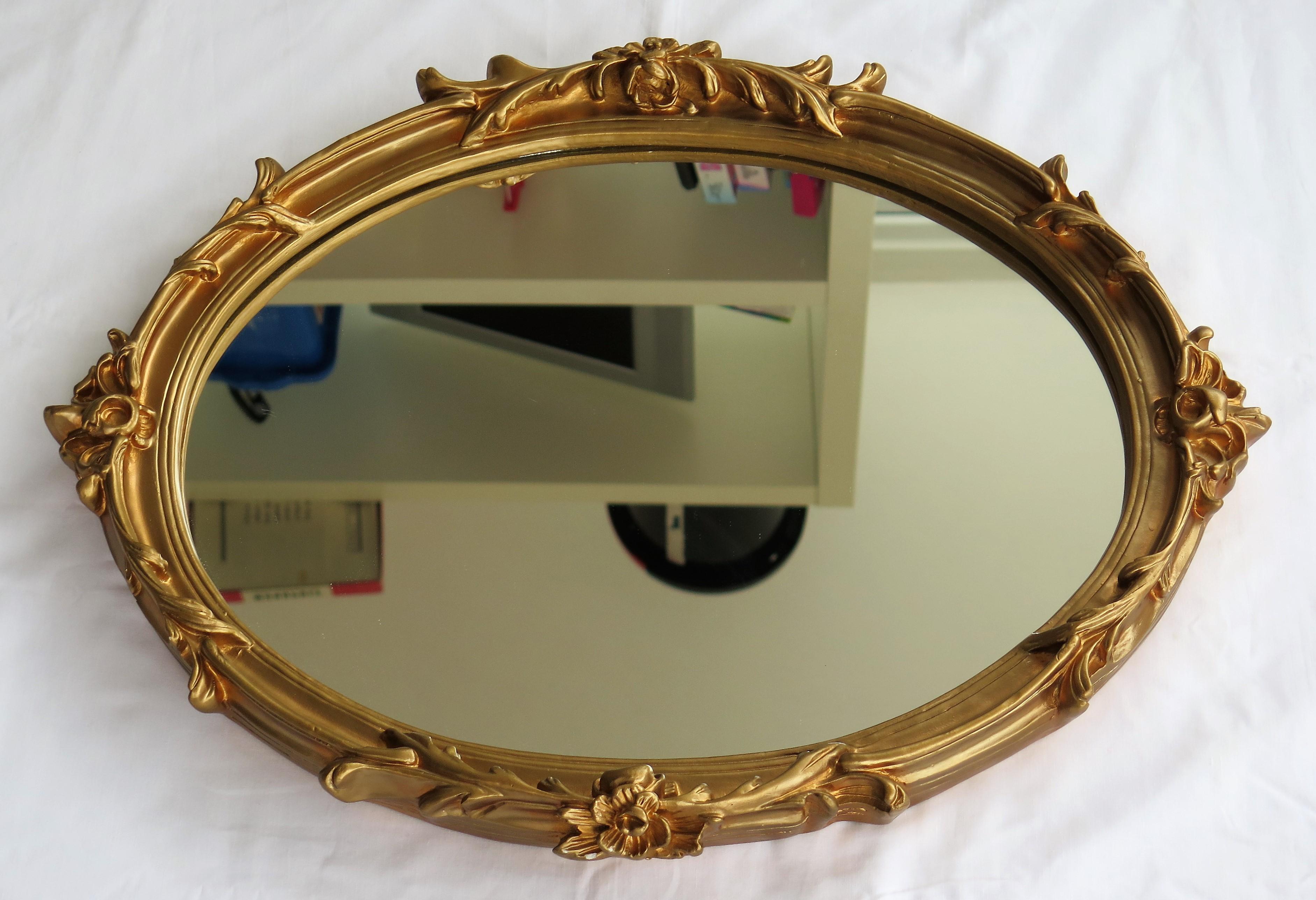 Rococo Revival Oval Wall Mirror with Rococo Gold Finish Frame of Gesso on Wood, circa 1930