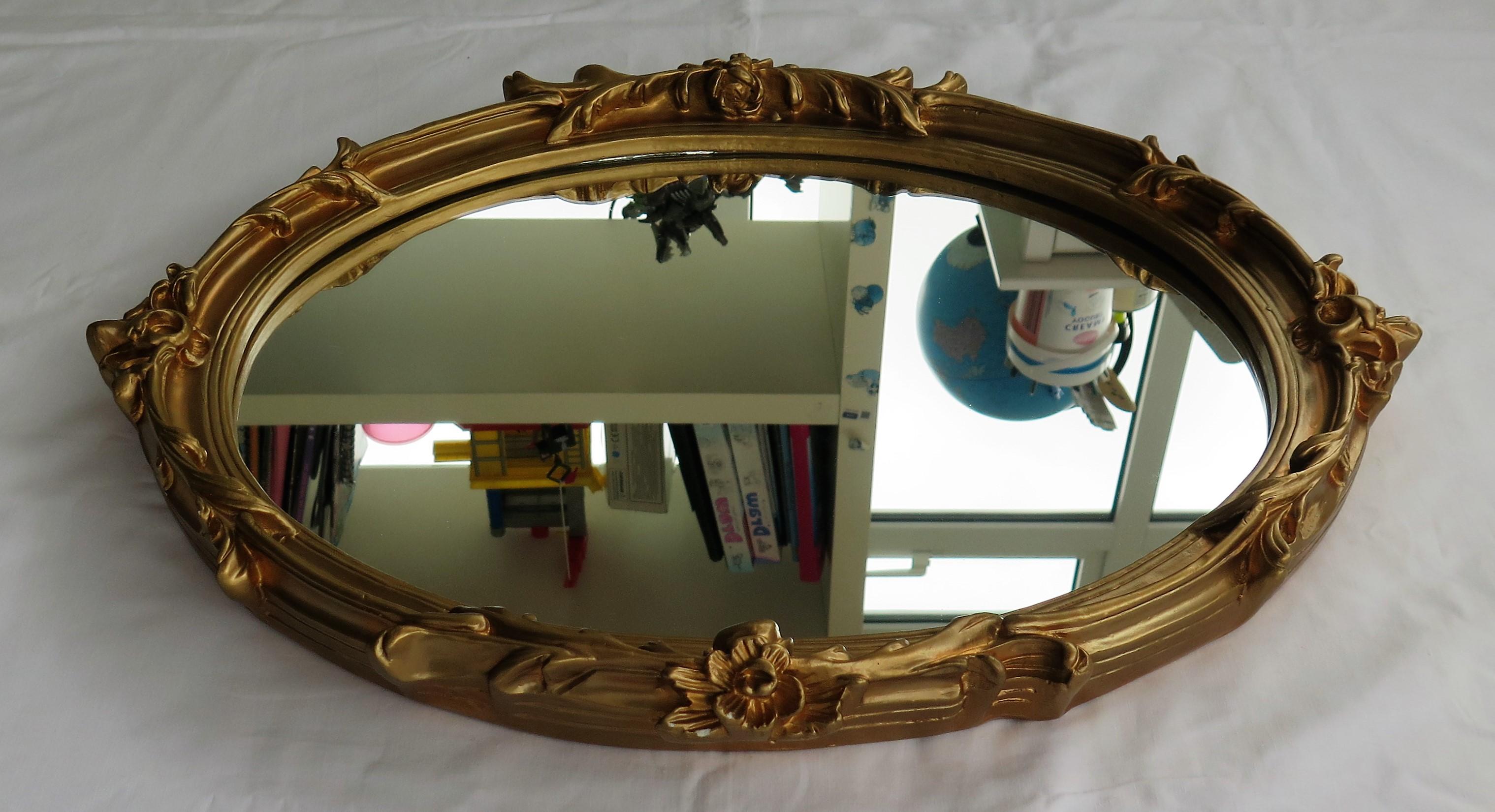 Oval Wall Mirror with Rococo Gold Finish Frame of Gesso on Wood, circa 1930 In Good Condition In Lincoln, Lincolnshire