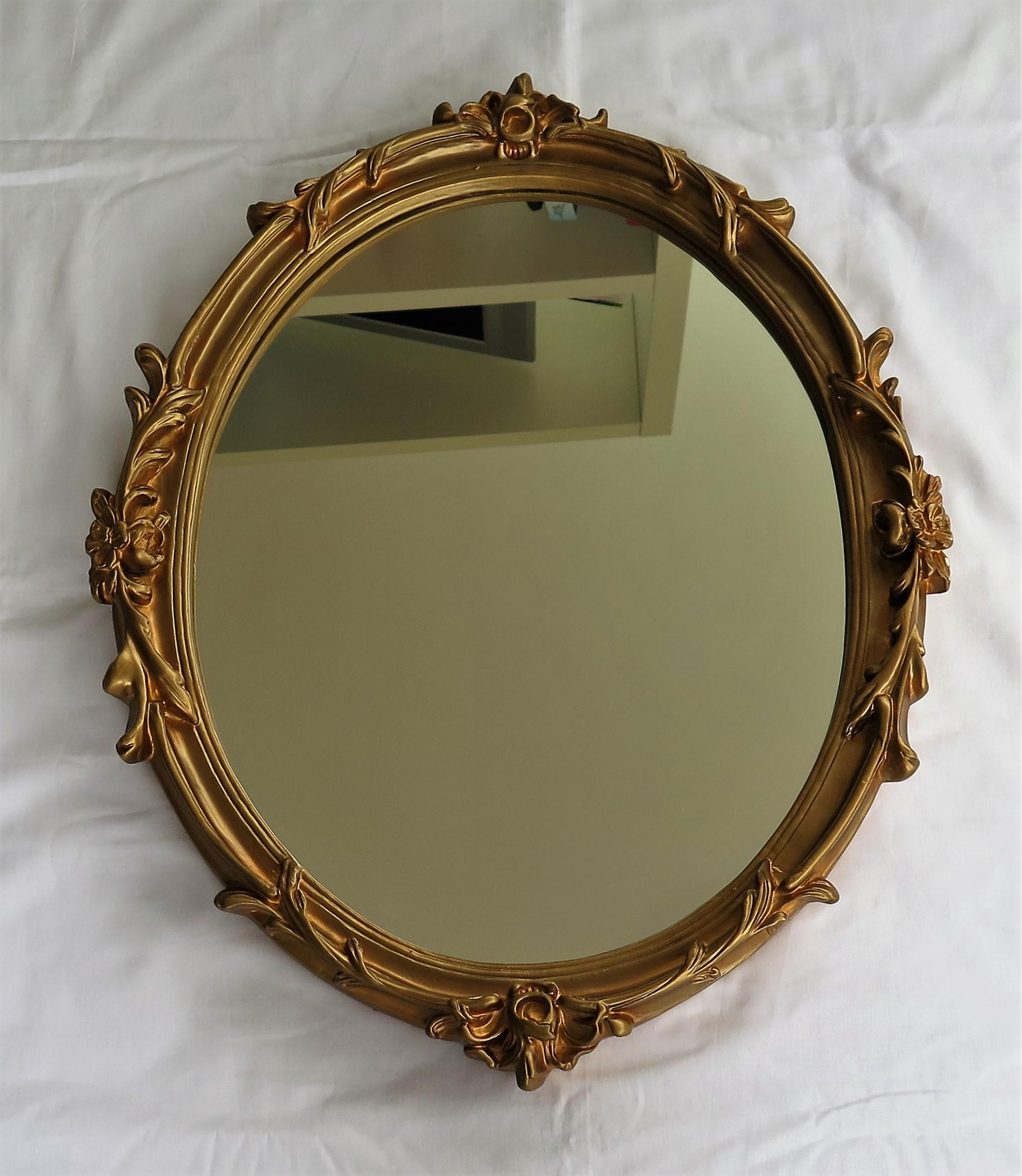 20th Century Oval Wall Mirror with Rococo Gold Finish Frame of Gesso on Wood, circa 1930