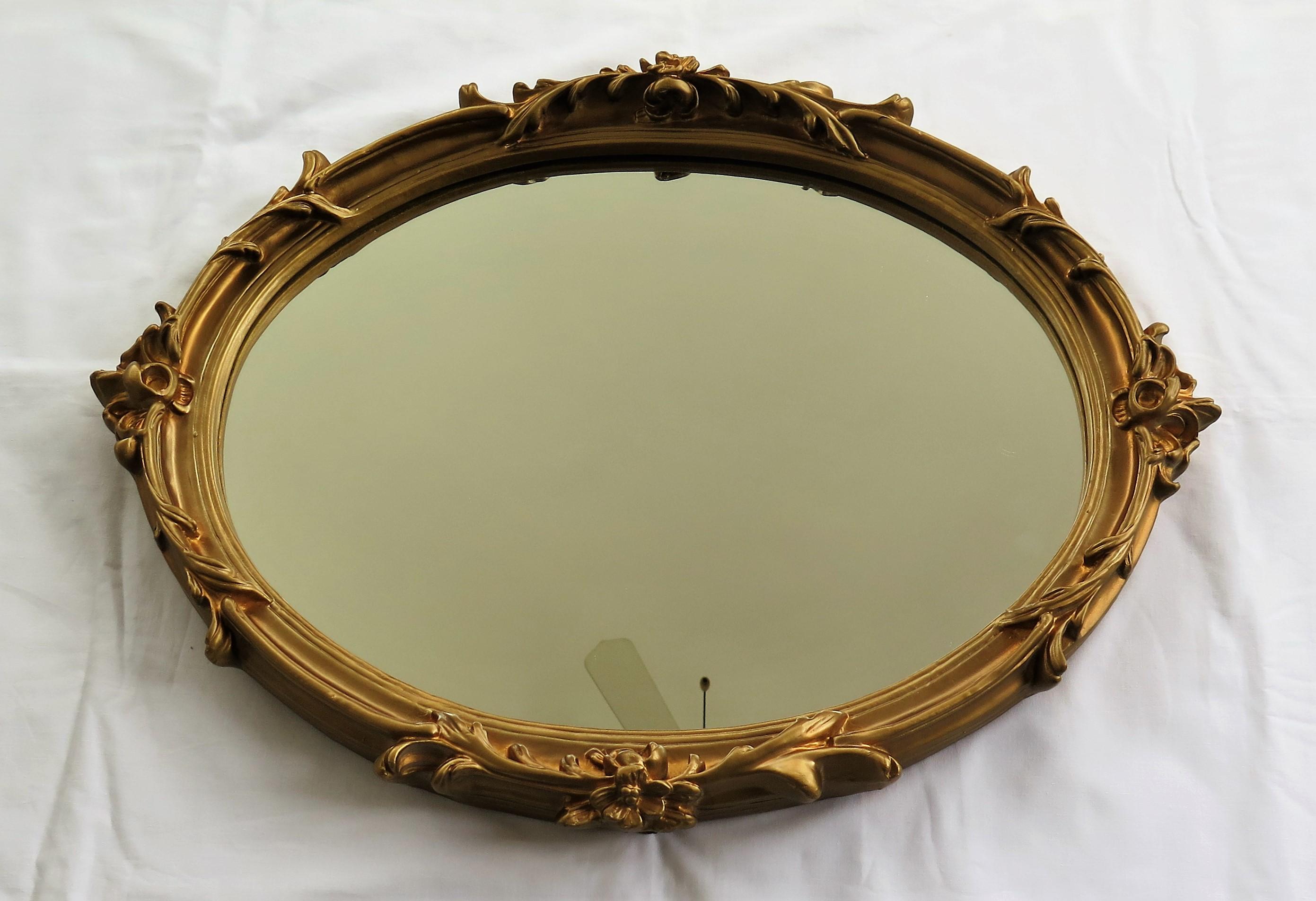 Oval Wall Mirror with Rococo Gold Finish Frame of Gesso on Wood, circa 1930 1