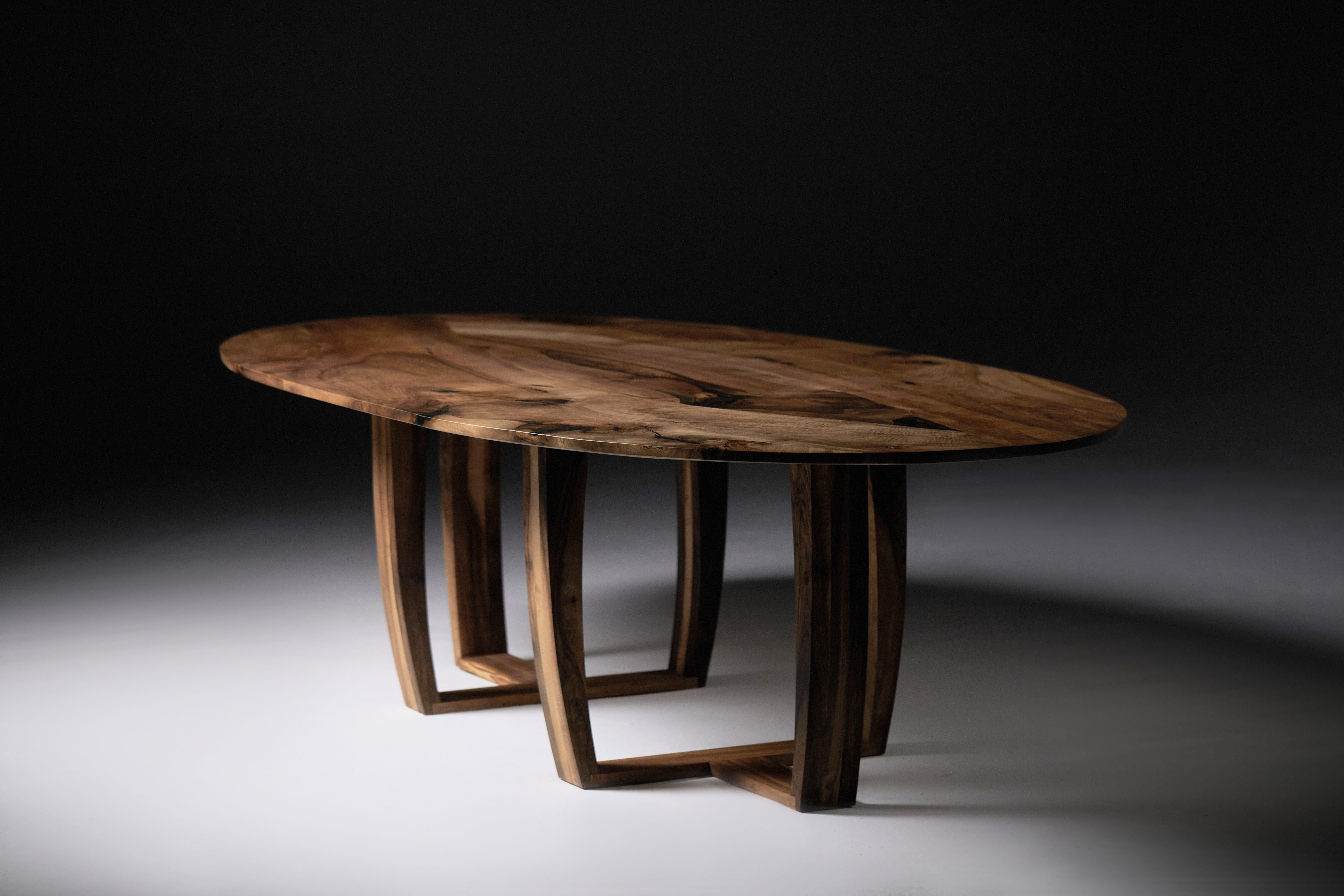 Oval Walnut Dining Table.

This table was commissioned for a private client to a bespoke size from carefully selected French walnut for the top and English walnut for the legs.
The legs can be removed for transportation. The finish is a hard wax oil