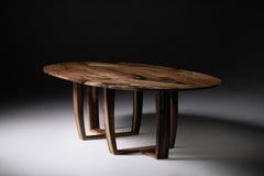 Table de salle à manger ovale en noyer par Jonathan Field