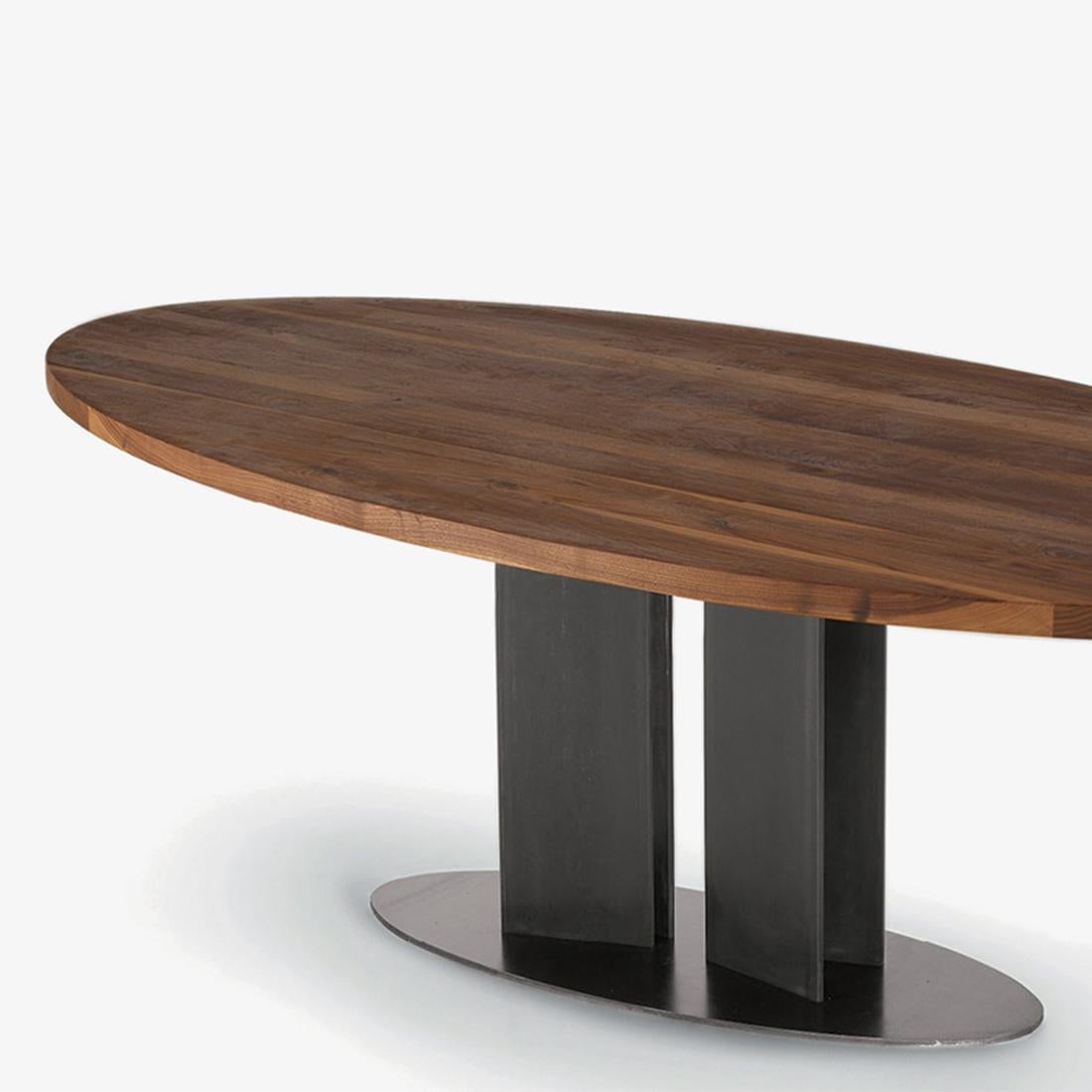 Dining table oval walnut with solid walnut top
and with iron base in lacquered matt finish.
Available in:
L 200 x D 100 x H 75cm, price: 9900,00€
L 220 x D 100 x H 75cm, price: 10500,00€
L 240 x D 100 x H 75cm, price: 11500,00€
L 260 x D 100 x H