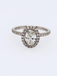 Oval Weighing 1.11 Carat in a 14 Karat Halo Setting, GIA Certificate I Color