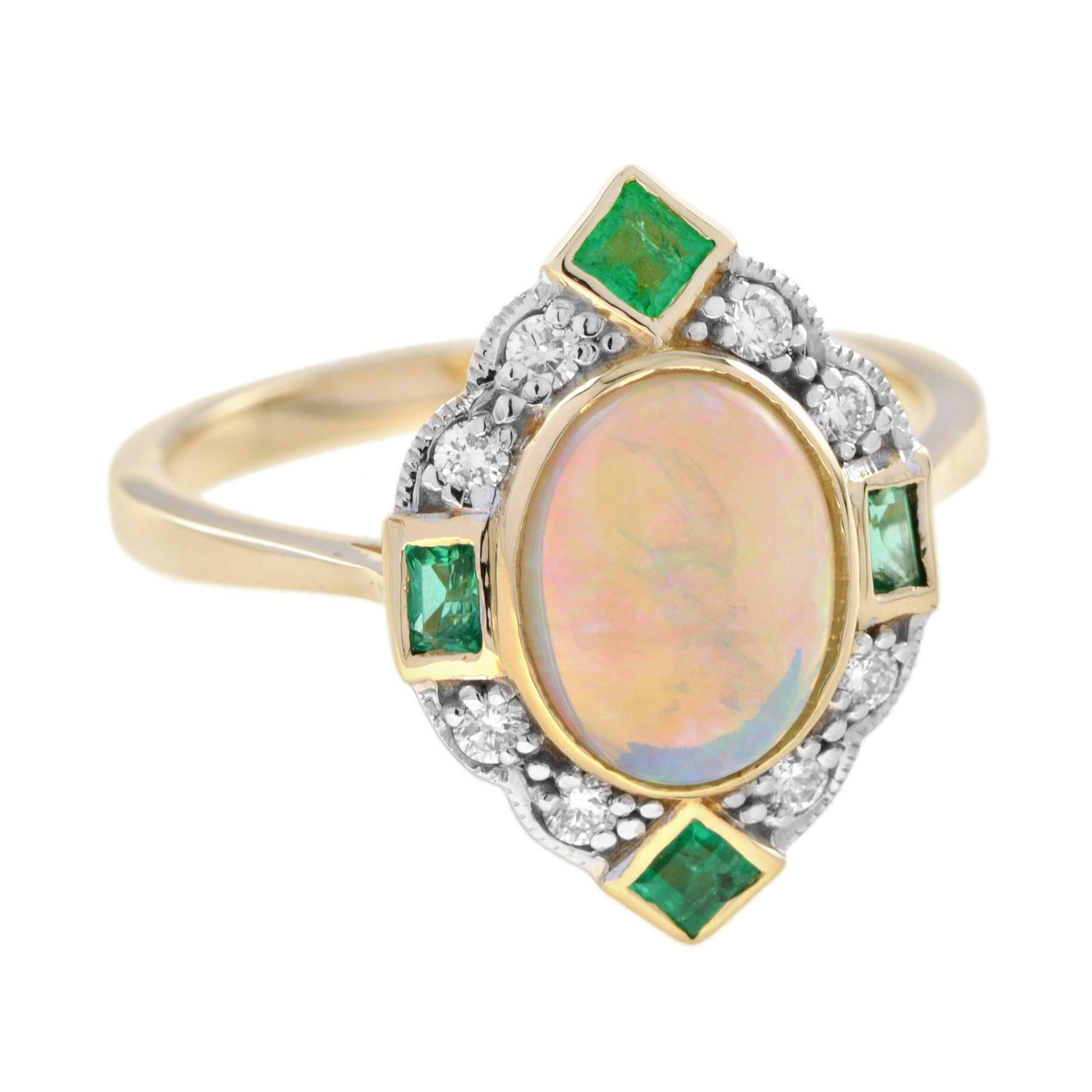 Un bellissimo opale australiano cabochon naturale è incastonato in un'aureola di diamanti rotondi, punteggiata da smeraldi taglio francese. La lavorazione a grana grossa aggiunge un tocco di stile vintage.  Oro giallo 14K. 
Informazioni