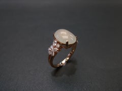 Oval White Icy Jade Marquise Diamond Unique Engagement Ring in Rose Gold