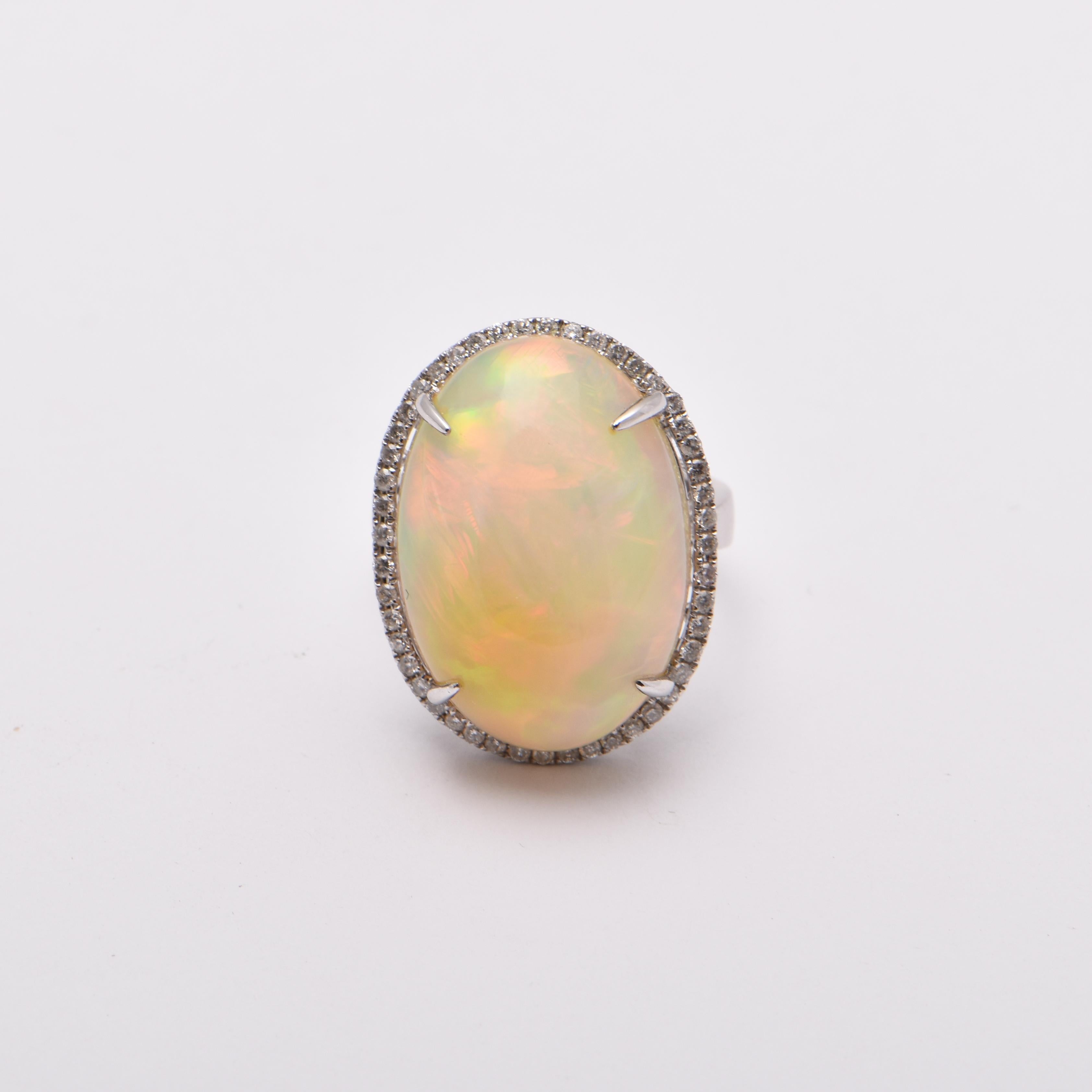 Oval Cut Oval White Opal and Diamond Halo Ring in 18 Carat White Gold For Sale