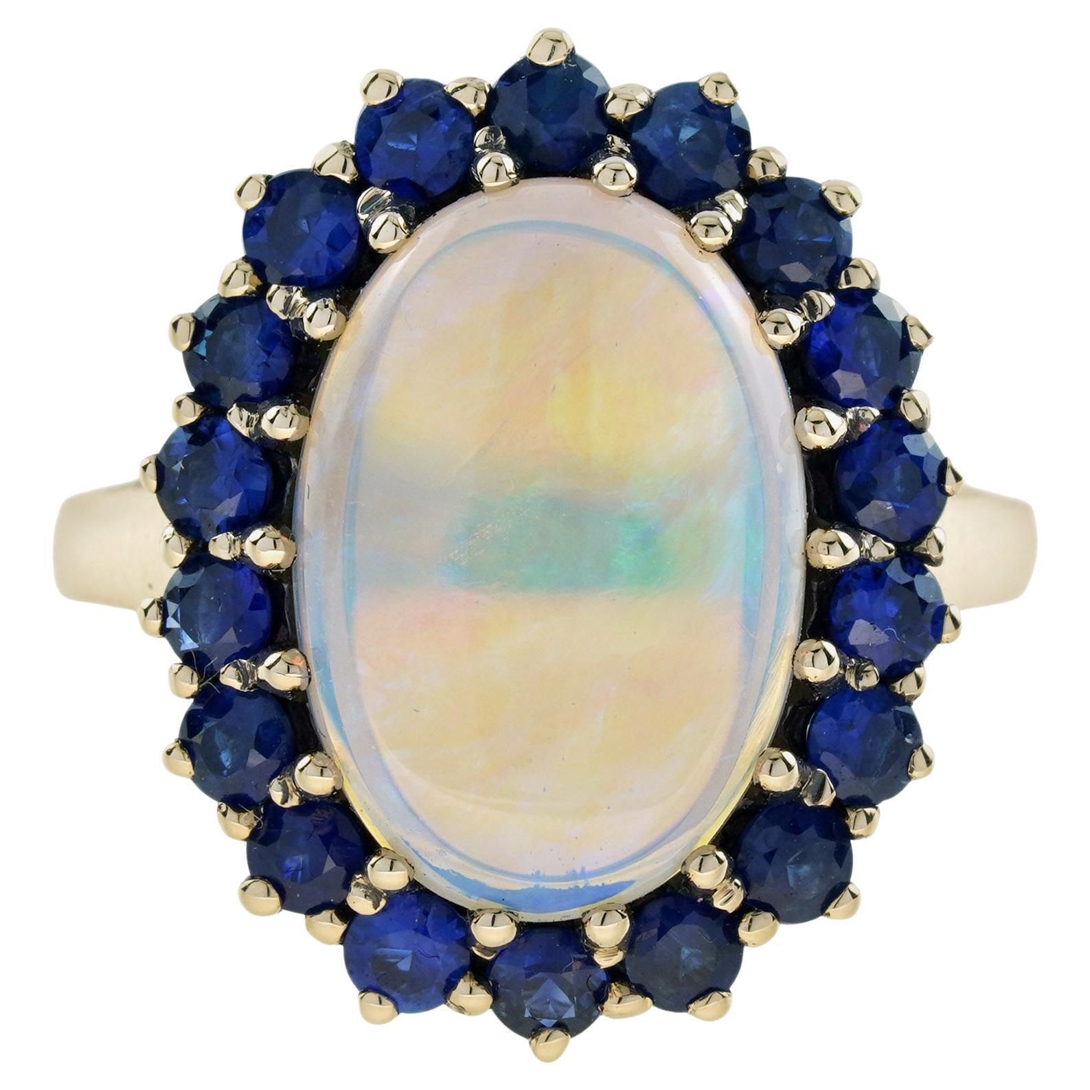 Oval White Opal with Blue Sapphire Vintage Style 9KT Yellow Gold Halo Set Ring