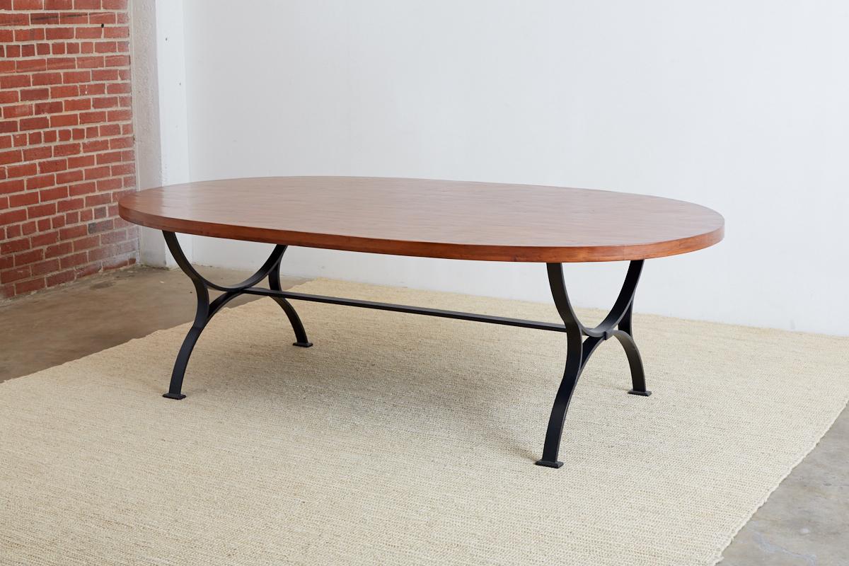 Oval Wooden Dining Table with Curule Iron Base 6