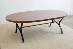 Oval Wooden Dining Table with Curule Iron Base