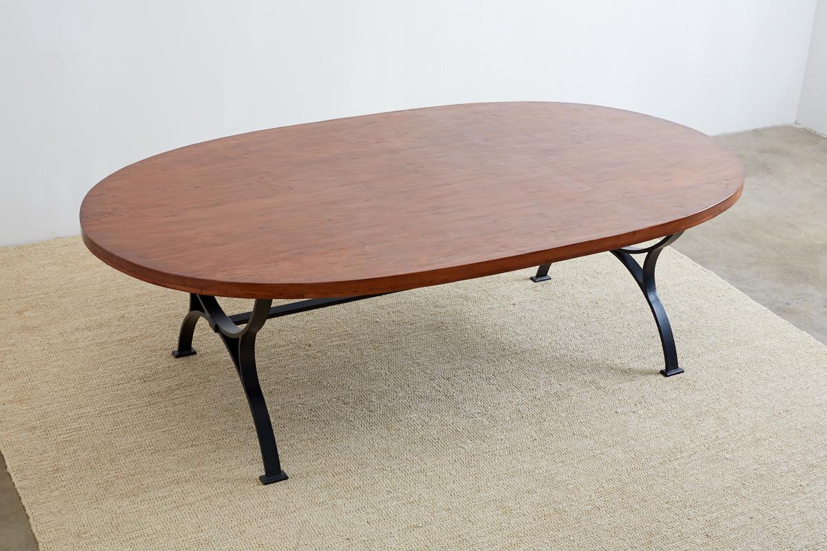 Hand-Crafted Oval Wooden Dining Table with Curule Iron Base