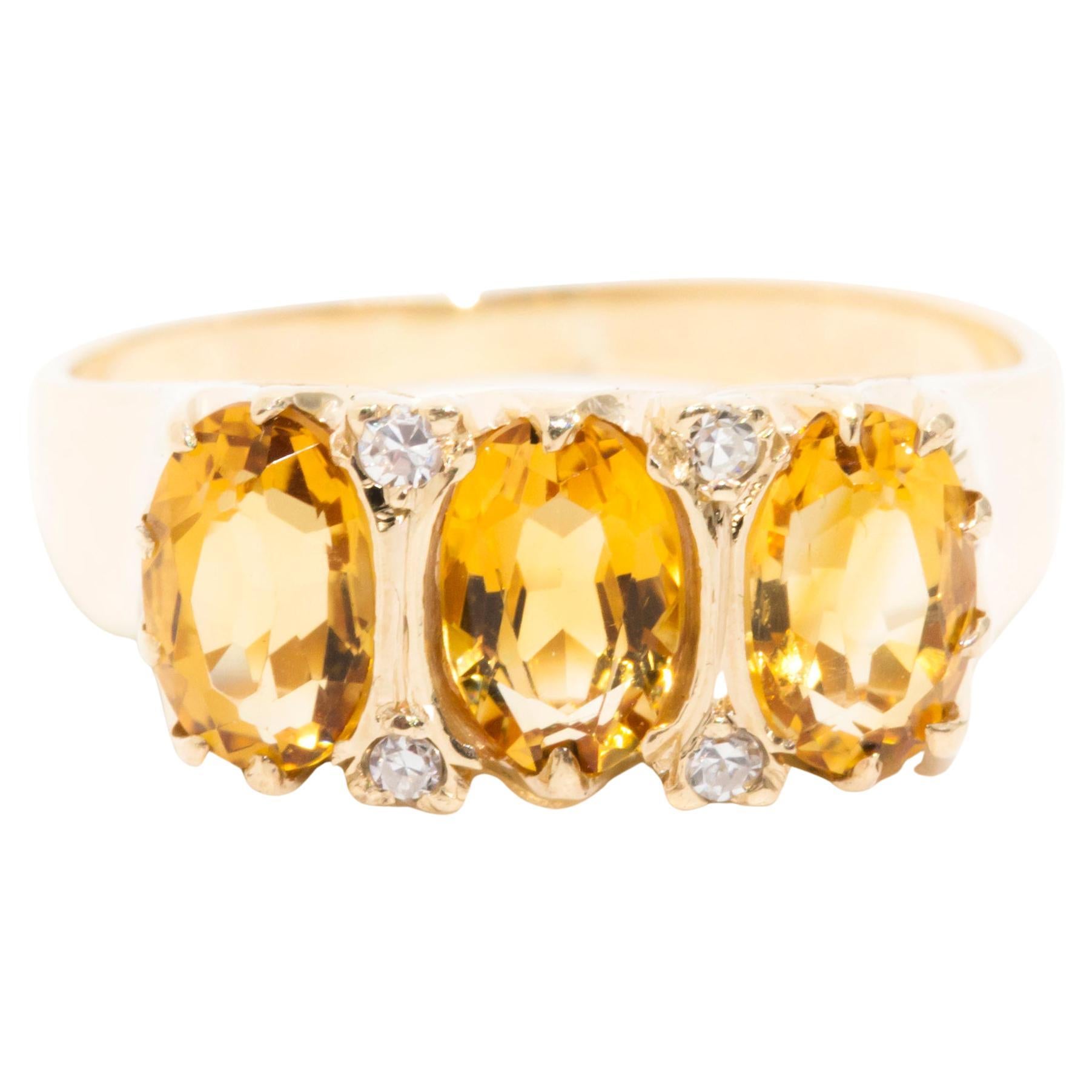 Oval Yellow Citrine and Diamond Vintage Three Stone Ring in 9 Carat Yellow Gold