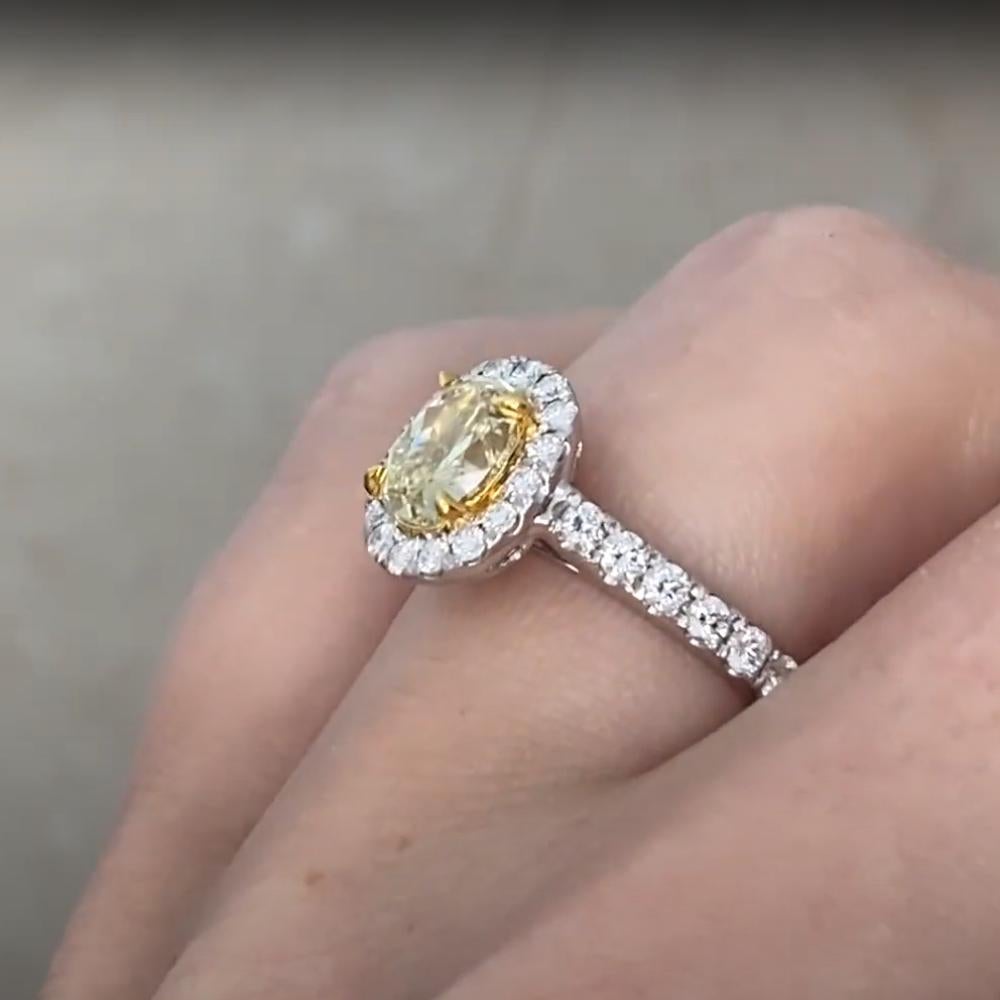 Oval Yellow Diamond (Approx. 1.10-Carats) Prong-Set Halo Ring, 18k White Gold In Excellent Condition For Sale In New York, NY