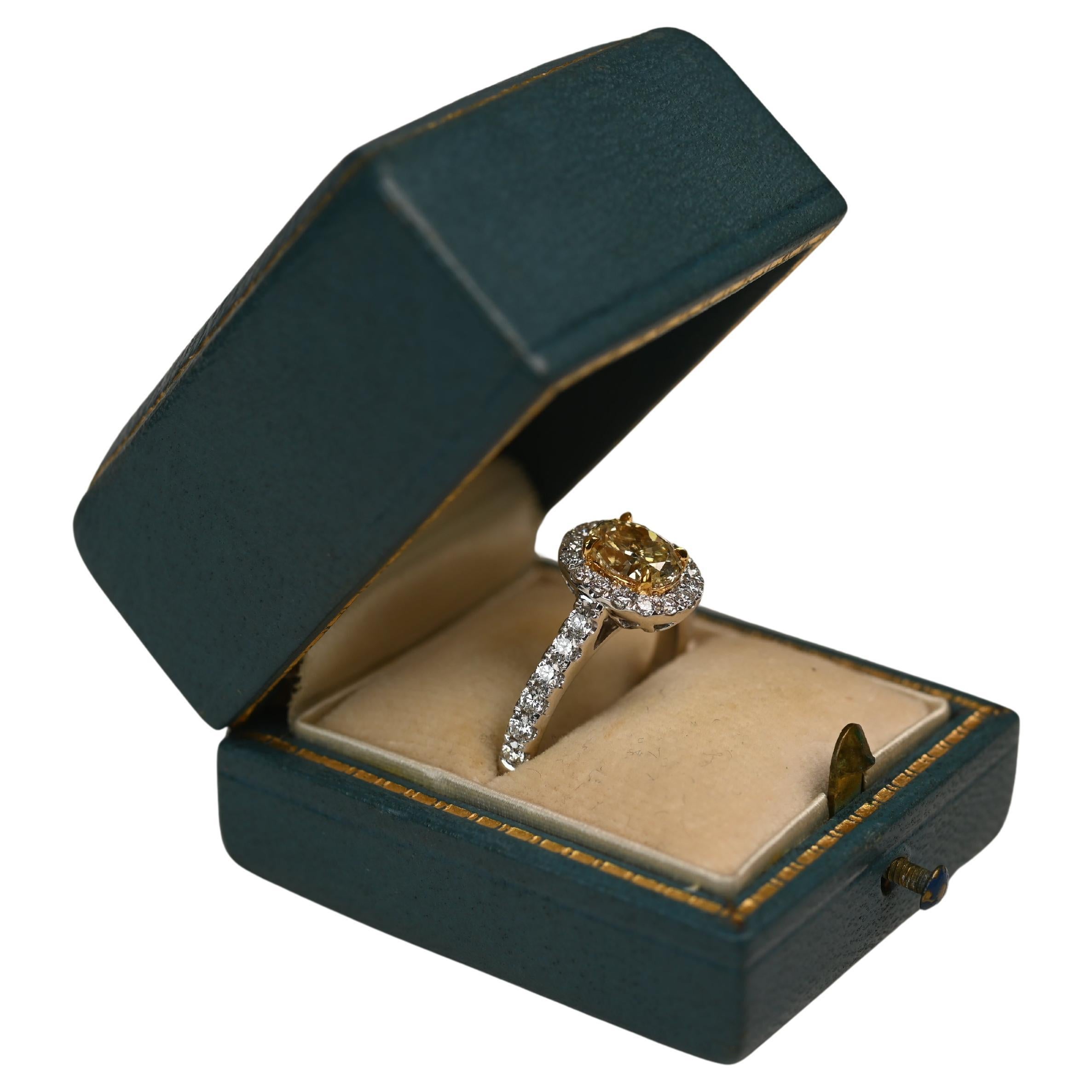 Oval Yellow Diamond (Approx. 1.10-Carats) Prong-Set Halo Ring, 18k White Gold
